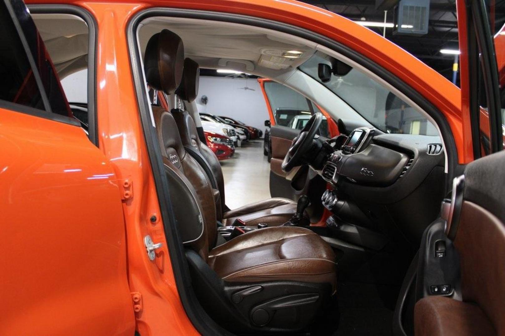 2016 Arancio (Orange) /Brown Fiat 500X Trekking Plus (ZFBCFYET8GP) with an 2.4L I4 MultiAir engine, Automatic transmission, located at 15300 Midway Rd., Addison, TX, 75001, (972) 702-0011, 32.958321, -96.838074 - Midway Auto Group in Addison, TX, is pleased to offer this 2016 Fiat 500X Trekking Plus, a subcompact crossover that combines Italian design flair with versatile functionality.<br><br>Key Features:<br><br>Engine and Performance: Powered by a 2.4-liter Tigershark MultiAir 2 inline-4 engine deliveri - Photo#14