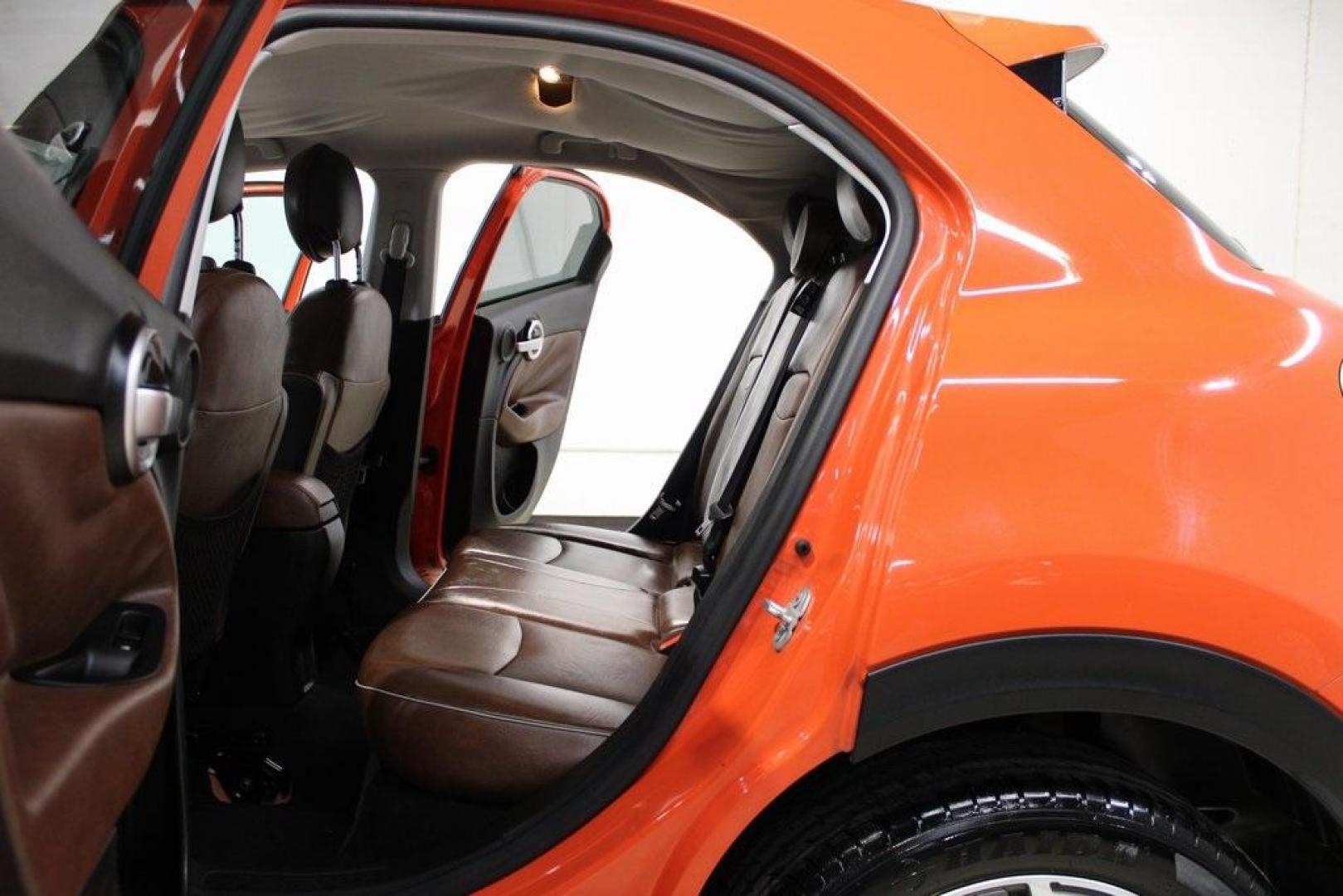2016 Arancio (Orange) /Brown Fiat 500X Trekking Plus (ZFBCFYET8GP) with an 2.4L I4 MultiAir engine, Automatic transmission, located at 15300 Midway Rd., Addison, TX, 75001, (972) 702-0011, 32.958321, -96.838074 - Midway Auto Group in Addison, TX, is pleased to offer this 2016 Fiat 500X Trekking Plus, a subcompact crossover that combines Italian design flair with versatile functionality.<br><br>Key Features:<br><br>Engine and Performance: Powered by a 2.4-liter Tigershark MultiAir 2 inline-4 engine deliveri - Photo#16