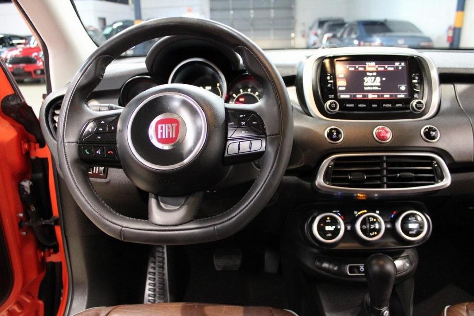 2016 Arancio (Orange) /Brown Fiat 500X Trekking Plus (ZFBCFYET8GP) with an 2.4L I4 MultiAir engine, Automatic transmission, located at 15300 Midway Rd., Addison, TX, 75001, (972) 702-0011, 32.958321, -96.838074 - Midway Auto Group in Addison, TX, is pleased to offer this 2016 Fiat 500X Trekking Plus, a subcompact crossover that combines Italian design flair with versatile functionality.<br><br>Key Features:<br><br>Engine and Performance: Powered by a 2.4-liter Tigershark MultiAir 2 inline-4 engine deliveri - Photo#17