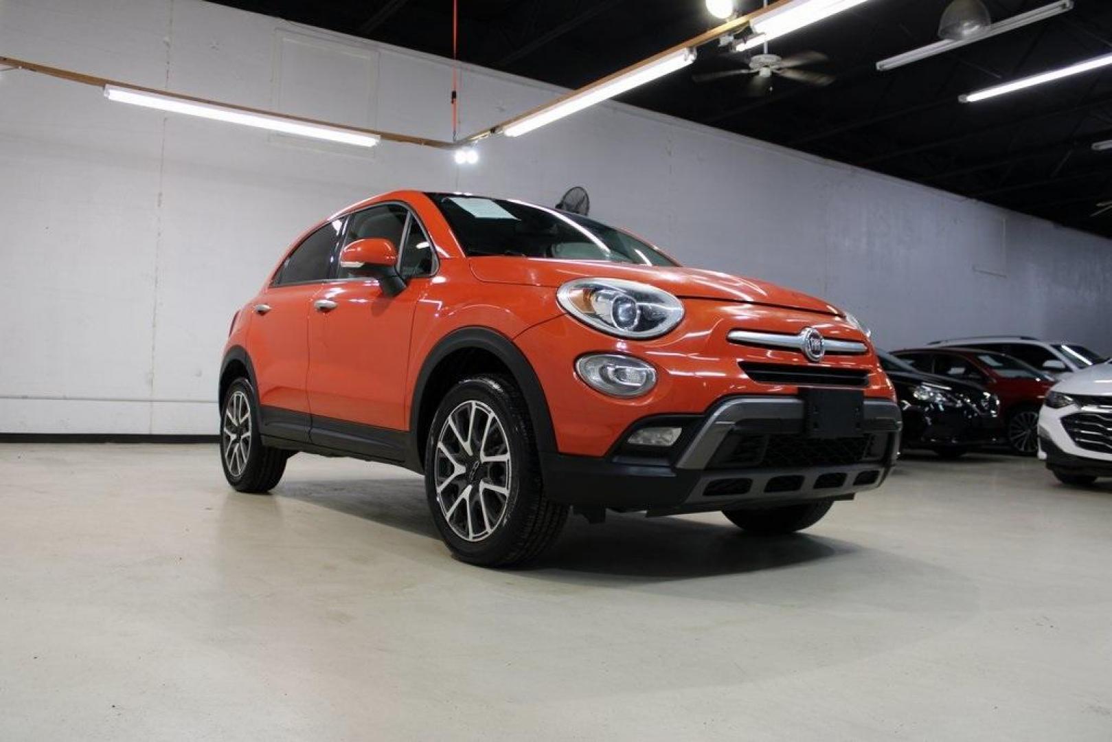 2016 Arancio (Orange) /Brown Fiat 500X Trekking Plus (ZFBCFYET8GP) with an 2.4L I4 MultiAir engine, Automatic transmission, located at 15300 Midway Rd., Addison, TX, 75001, (972) 702-0011, 32.958321, -96.838074 - Midway Auto Group in Addison, TX, is pleased to offer this 2016 Fiat 500X Trekking Plus, a subcompact crossover that combines Italian design flair with versatile functionality.<br><br>Key Features:<br><br>Engine and Performance: Powered by a 2.4-liter Tigershark MultiAir 2 inline-4 engine deliveri - Photo#2