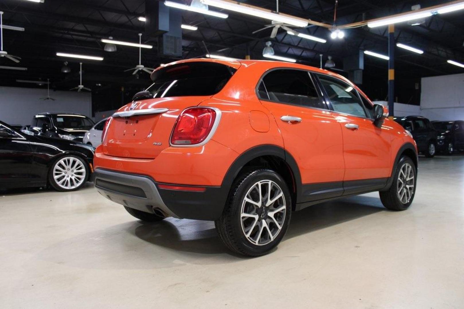 2016 Arancio (Orange) /Brown Fiat 500X Trekking Plus (ZFBCFYET8GP) with an 2.4L I4 MultiAir engine, Automatic transmission, located at 15300 Midway Rd., Addison, TX, 75001, (972) 702-0011, 32.958321, -96.838074 - Midway Auto Group in Addison, TX, is pleased to offer this 2016 Fiat 500X Trekking Plus, a subcompact crossover that combines Italian design flair with versatile functionality.<br><br>Key Features:<br><br>Engine and Performance: Powered by a 2.4-liter Tigershark MultiAir 2 inline-4 engine deliveri - Photo#3