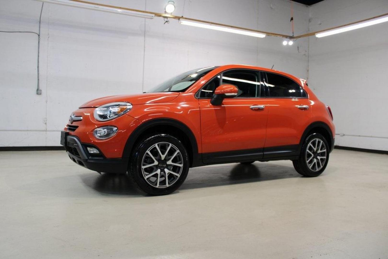 2016 Arancio (Orange) /Brown Fiat 500X Trekking Plus (ZFBCFYET8GP) with an 2.4L I4 MultiAir engine, Automatic transmission, located at 15300 Midway Rd., Addison, TX, 75001, (972) 702-0011, 32.958321, -96.838074 - Midway Auto Group in Addison, TX, is pleased to offer this 2016 Fiat 500X Trekking Plus, a subcompact crossover that combines Italian design flair with versatile functionality.<br><br>Key Features:<br><br>Engine and Performance: Powered by a 2.4-liter Tigershark MultiAir 2 inline-4 engine deliveri - Photo#5