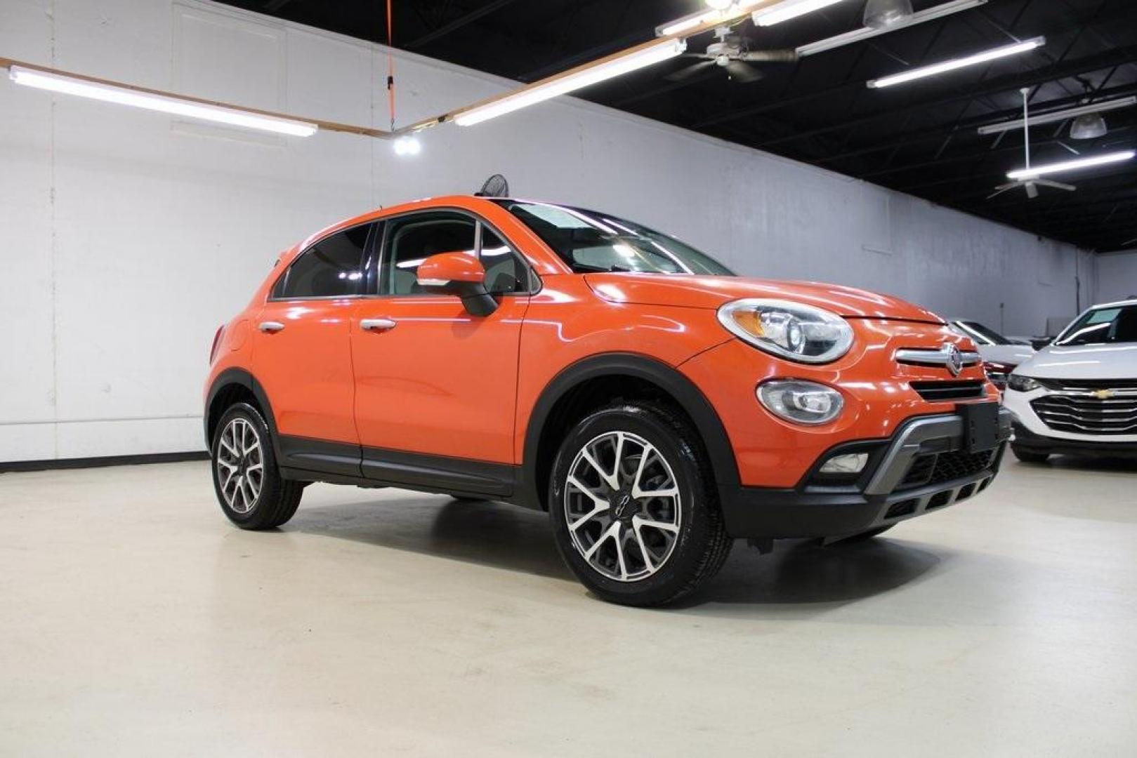 2016 Arancio (Orange) /Brown Fiat 500X Trekking Plus (ZFBCFYET8GP) with an 2.4L I4 MultiAir engine, Automatic transmission, located at 15300 Midway Rd., Addison, TX, 75001, (972) 702-0011, 32.958321, -96.838074 - Midway Auto Group in Addison, TX, is pleased to offer this 2016 Fiat 500X Trekking Plus, a subcompact crossover that combines Italian design flair with versatile functionality.<br><br>Key Features:<br><br>Engine and Performance: Powered by a 2.4-liter Tigershark MultiAir 2 inline-4 engine deliveri - Photo#7