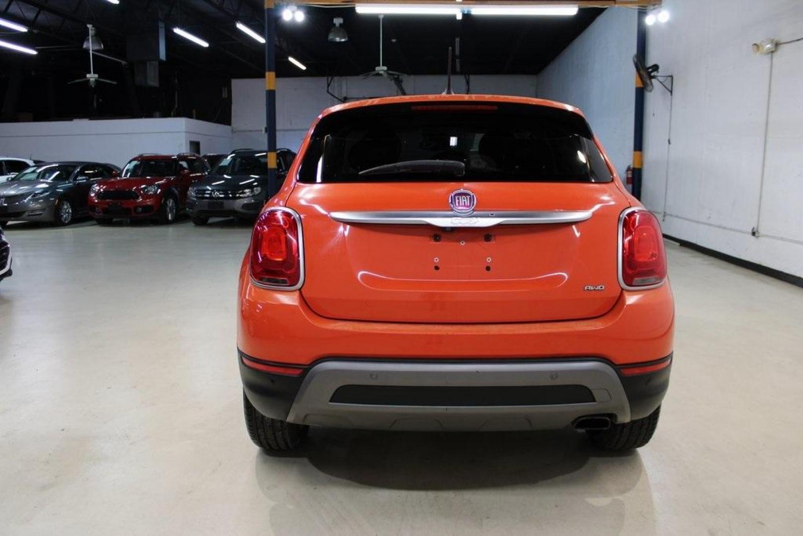 2016 Arancio (Orange) /Brown Fiat 500X Trekking Plus (ZFBCFYET8GP) with an 2.4L I4 MultiAir engine, Automatic transmission, located at 15300 Midway Rd., Addison, TX, 75001, (972) 702-0011, 32.958321, -96.838074 - Midway Auto Group in Addison, TX, is pleased to offer this 2016 Fiat 500X Trekking Plus, a subcompact crossover that combines Italian design flair with versatile functionality.<br><br>Key Features:<br><br>Engine and Performance: Powered by a 2.4-liter Tigershark MultiAir 2 inline-4 engine deliveri - Photo#8