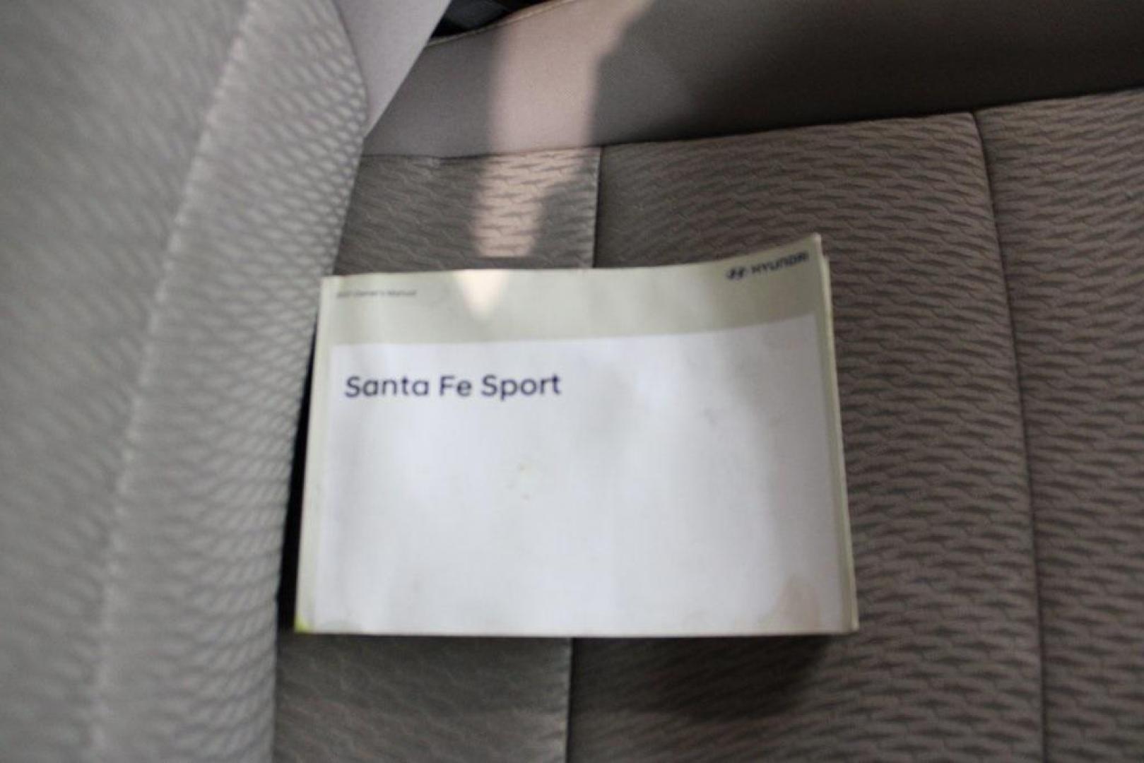 2017 Canyon Copper /Beige Hyundai Santa Fe Sport 2.4 Base (5XYZT3LB1HG) with an 2.4L I4 DGI DOHC 16V engine, Automatic transmission, located at 15300 Midway Rd., Addison, TX, 75001, (972) 702-0011, 32.958321, -96.838074 - Midway Auto Group in Addison, TX, is pleased to offer this 2017 Hyundai Santa Fe Sport, a versatile and stylish SUV that combines performance, comfort, and advanced features.<br><br>Key Features:<br><br>Engine and Performance: Powered by a 2.4-liter inline-4 engine, delivering a balance of power a - Photo#12