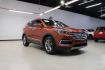 2017 Canyon Copper /Beige Hyundai Santa Fe Sport 2.4 Base (5XYZT3LB1HG) with an 2.4L I4 DGI DOHC 16V engine, Automatic transmission, located at 15300 Midway Rd., Addison, TX, 75001, (972) 702-0011, 32.958321, -96.838074 - Midway Auto Group in Addison, TX, is pleased to offer this 2017 Hyundai Santa Fe Sport, a versatile and stylish SUV that combines performance, comfort, and advanced features.<br><br>Key Features:<br><br>Engine and Performance: Powered by a 2.4-liter inline-4 engine, delivering a balance of power a - Photo#1
