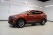 2017 Canyon Copper /Beige Hyundai Santa Fe Sport 2.4 Base (5XYZT3LB1HG) with an 2.4L I4 DGI DOHC 16V engine, Automatic transmission, located at 15300 Midway Rd., Addison, TX, 75001, (972) 702-0011, 32.958321, -96.838074 - Midway Auto Group in Addison, TX, is pleased to offer this 2017 Hyundai Santa Fe Sport, a versatile and stylish SUV that combines performance, comfort, and advanced features.<br><br>Key Features:<br><br>Engine and Performance: Powered by a 2.4-liter inline-4 engine, delivering a balance of power a - Photo#4