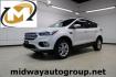 2018 White Platinum /Medium Light Stone Ford Escape SEL (1FMCU9HD7JU) with an 1.5L EcoBoost engine, Automatic transmission, located at 15300 Midway Rd., Addison, TX, 75001, (972) 702-0011, 32.958321, -96.838074 - Midway Auto Group in Addison, TX, is pleased to offer this 2018 Ford Escape SEL, a versatile and stylish SUV designed to meet your driving needs.<br><br>Key Features:<br><br>Engine and Performance: Powered by a 1.5L EcoBoost engine paired with an automatic transmission, delivering a balanced blend - Photo#0