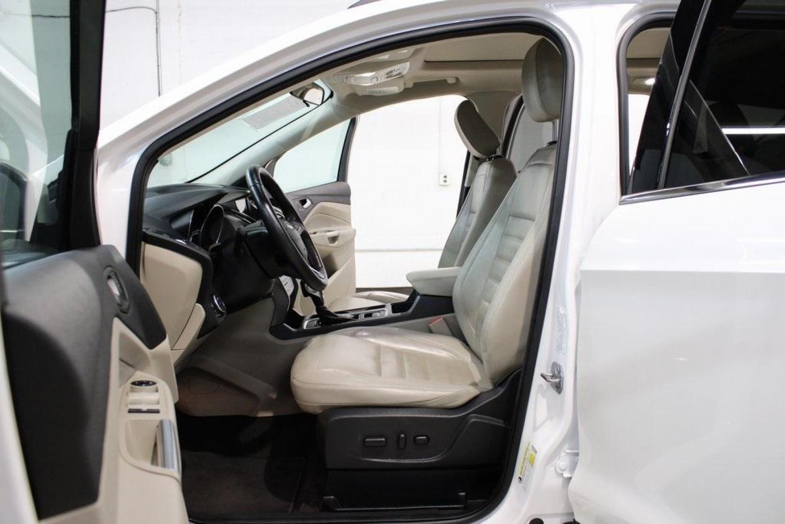 2018 White Platinum /Medium Light Stone Ford Escape SEL (1FMCU9HD7JU) with an 1.5L EcoBoost engine, Automatic transmission, located at 15300 Midway Rd., Addison, TX, 75001, (972) 702-0011, 32.958321, -96.838074 - Midway Auto Group in Addison, TX, is pleased to offer this 2018 Ford Escape SEL, a versatile and stylish SUV designed to meet your driving needs.<br><br>Key Features:<br><br>Engine and Performance: Powered by a 1.5L EcoBoost engine paired with an automatic transmission, delivering a balanced blend - Photo#13