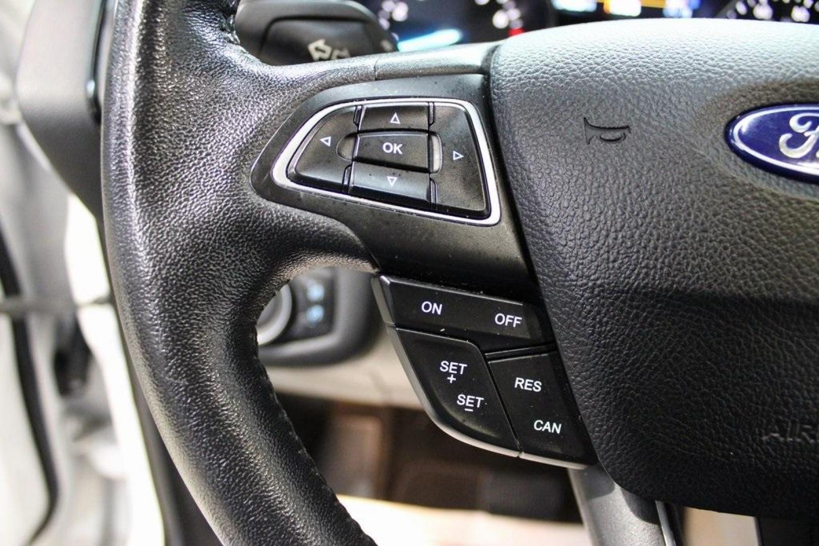 2018 White Platinum /Medium Light Stone Ford Escape SEL (1FMCU9HD7JU) with an 1.5L EcoBoost engine, Automatic transmission, located at 15300 Midway Rd., Addison, TX, 75001, (972) 702-0011, 32.958321, -96.838074 - Midway Auto Group in Addison, TX, is pleased to offer this 2018 Ford Escape SEL, a versatile and stylish SUV designed to meet your driving needs.<br><br>Key Features:<br><br>Engine and Performance: Powered by a 1.5L EcoBoost engine paired with an automatic transmission, delivering a balanced blend - Photo#25
