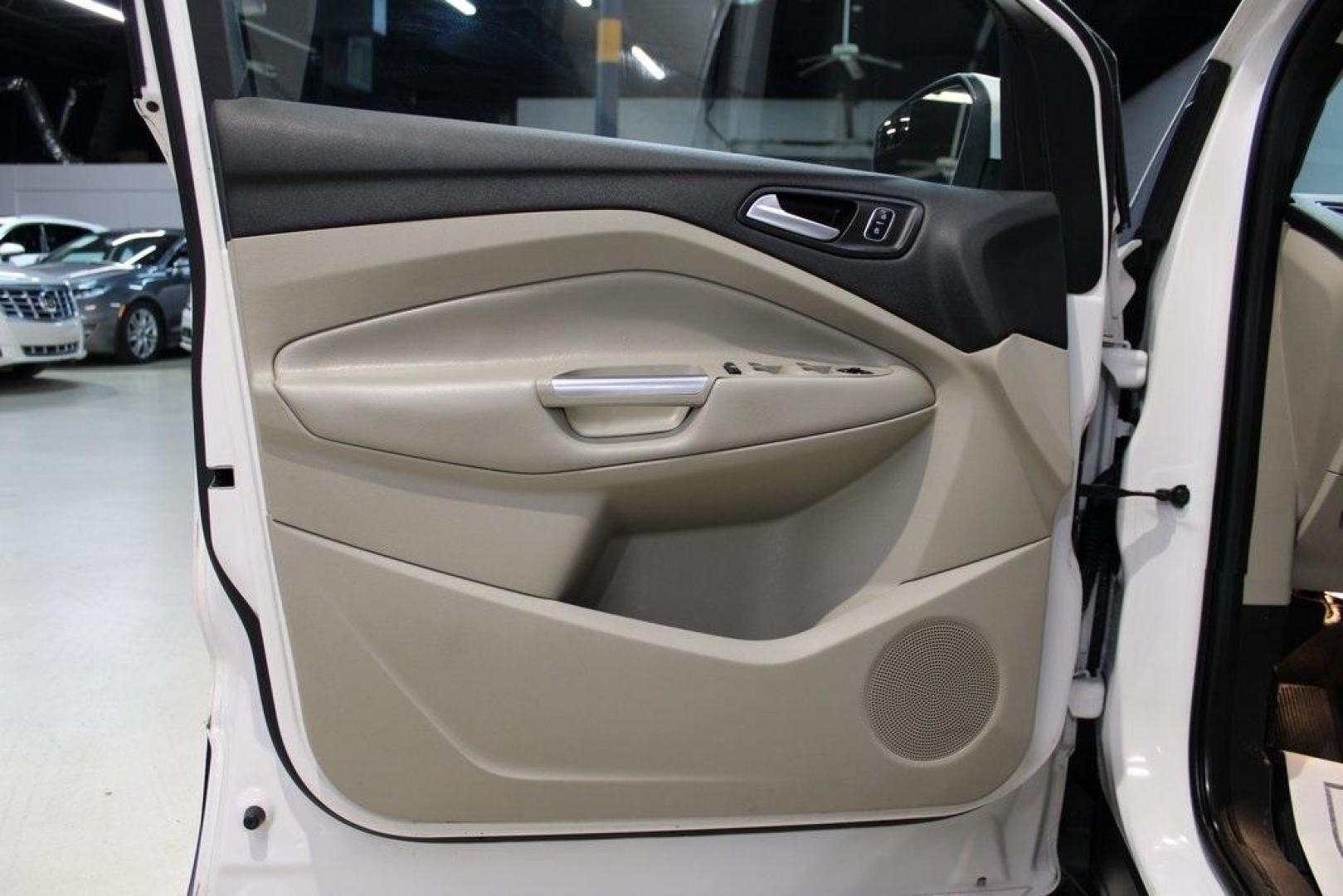 2018 White Platinum /Medium Light Stone Ford Escape SEL (1FMCU9HD7JU) with an 1.5L EcoBoost engine, Automatic transmission, located at 15300 Midway Rd., Addison, TX, 75001, (972) 702-0011, 32.958321, -96.838074 - Midway Auto Group in Addison, TX, is pleased to offer this 2018 Ford Escape SEL, a versatile and stylish SUV designed to meet your driving needs.<br><br>Key Features:<br><br>Engine and Performance: Powered by a 1.5L EcoBoost engine paired with an automatic transmission, delivering a balanced blend - Photo#27