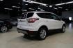 2018 White Platinum /Medium Light Stone Ford Escape SEL (1FMCU9HD7JU) with an 1.5L EcoBoost engine, Automatic transmission, located at 15300 Midway Rd., Addison, TX, 75001, (972) 702-0011, 32.958321, -96.838074 - Midway Auto Group in Addison, TX, is pleased to offer this 2018 Ford Escape SEL, a versatile and stylish SUV designed to meet your driving needs.<br><br>Key Features:<br><br>Engine and Performance: Powered by a 1.5L EcoBoost engine paired with an automatic transmission, delivering a balanced blend - Photo#2