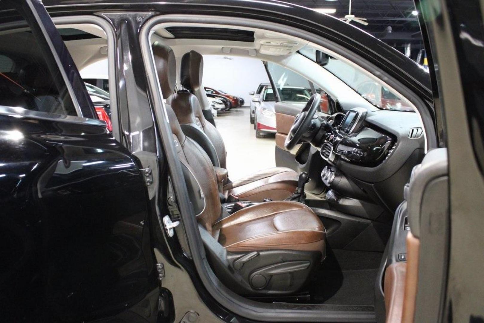 2016 Nero Cinema (Black Clear Coat) /Brown Fiat 500X Lounge (ZFBCFXDT8GP) with an 2.4L I4 MultiAir engine, Automatic transmission, located at 15300 Midway Rd., Addison, TX, 75001, (972) 702-0011, 32.958321, -96.838074 - Midway Auto Group in Addison, TX, is excited to offer this 2016 Fiat 500X Easy, a stylish and versatile subcompact crossover SUV that combines Italian design with practical functionality.<br><br>Key Features:<br><br>Engine and Performance: Equipped with a 2.4-liter Tigershark MultiAir 2 inline-4 e - Photo#15