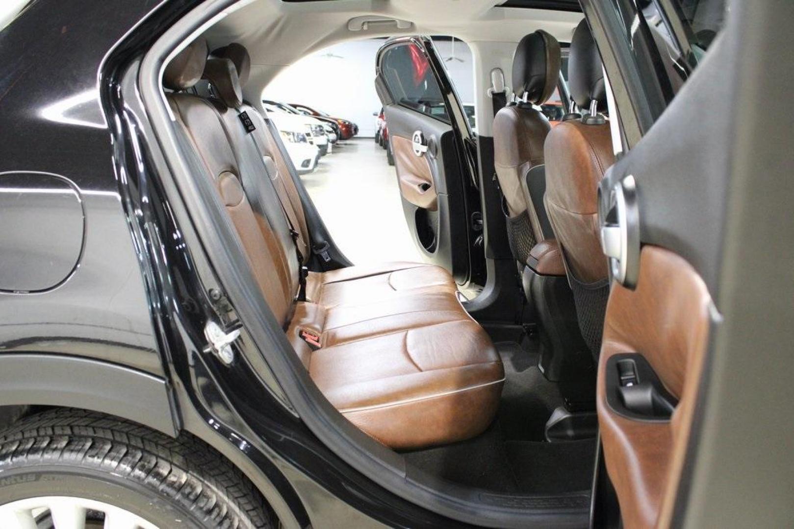 2016 Nero Cinema (Black Clear Coat) /Brown Fiat 500X Lounge (ZFBCFXDT8GP) with an 2.4L I4 MultiAir engine, Automatic transmission, located at 15300 Midway Rd., Addison, TX, 75001, (972) 702-0011, 32.958321, -96.838074 - Midway Auto Group in Addison, TX, is excited to offer this 2016 Fiat 500X Easy, a stylish and versatile subcompact crossover SUV that combines Italian design with practical functionality.<br><br>Key Features:<br><br>Engine and Performance: Equipped with a 2.4-liter Tigershark MultiAir 2 inline-4 e - Photo#16