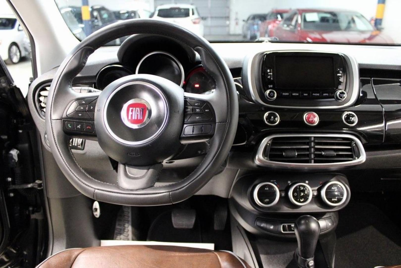 2016 Nero Cinema (Black Clear Coat) /Brown Fiat 500X Lounge (ZFBCFXDT8GP) with an 2.4L I4 MultiAir engine, Automatic transmission, located at 15300 Midway Rd., Addison, TX, 75001, (972) 702-0011, 32.958321, -96.838074 - Midway Auto Group in Addison, TX, is excited to offer this 2016 Fiat 500X Easy, a stylish and versatile subcompact crossover SUV that combines Italian design with practical functionality.<br><br>Key Features:<br><br>Engine and Performance: Equipped with a 2.4-liter Tigershark MultiAir 2 inline-4 e - Photo#18