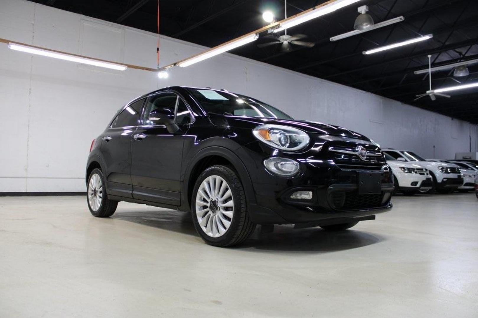 2016 Nero Cinema (Black Clear Coat) /Brown Fiat 500X Lounge (ZFBCFXDT8GP) with an 2.4L I4 MultiAir engine, Automatic transmission, located at 15300 Midway Rd., Addison, TX, 75001, (972) 702-0011, 32.958321, -96.838074 - Midway Auto Group in Addison, TX, is excited to offer this 2016 Fiat 500X Easy, a stylish and versatile subcompact crossover SUV that combines Italian design with practical functionality.<br><br>Key Features:<br><br>Engine and Performance: Equipped with a 2.4-liter Tigershark MultiAir 2 inline-4 e - Photo#1