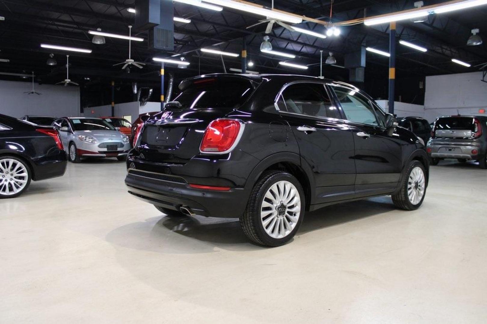 2016 Nero Cinema (Black Clear Coat) /Brown Fiat 500X Lounge (ZFBCFXDT8GP) with an 2.4L I4 MultiAir engine, Automatic transmission, located at 15300 Midway Rd., Addison, TX, 75001, (972) 702-0011, 32.958321, -96.838074 - Midway Auto Group in Addison, TX, is excited to offer this 2016 Fiat 500X Easy, a stylish and versatile subcompact crossover SUV that combines Italian design with practical functionality.<br><br>Key Features:<br><br>Engine and Performance: Equipped with a 2.4-liter Tigershark MultiAir 2 inline-4 e - Photo#2