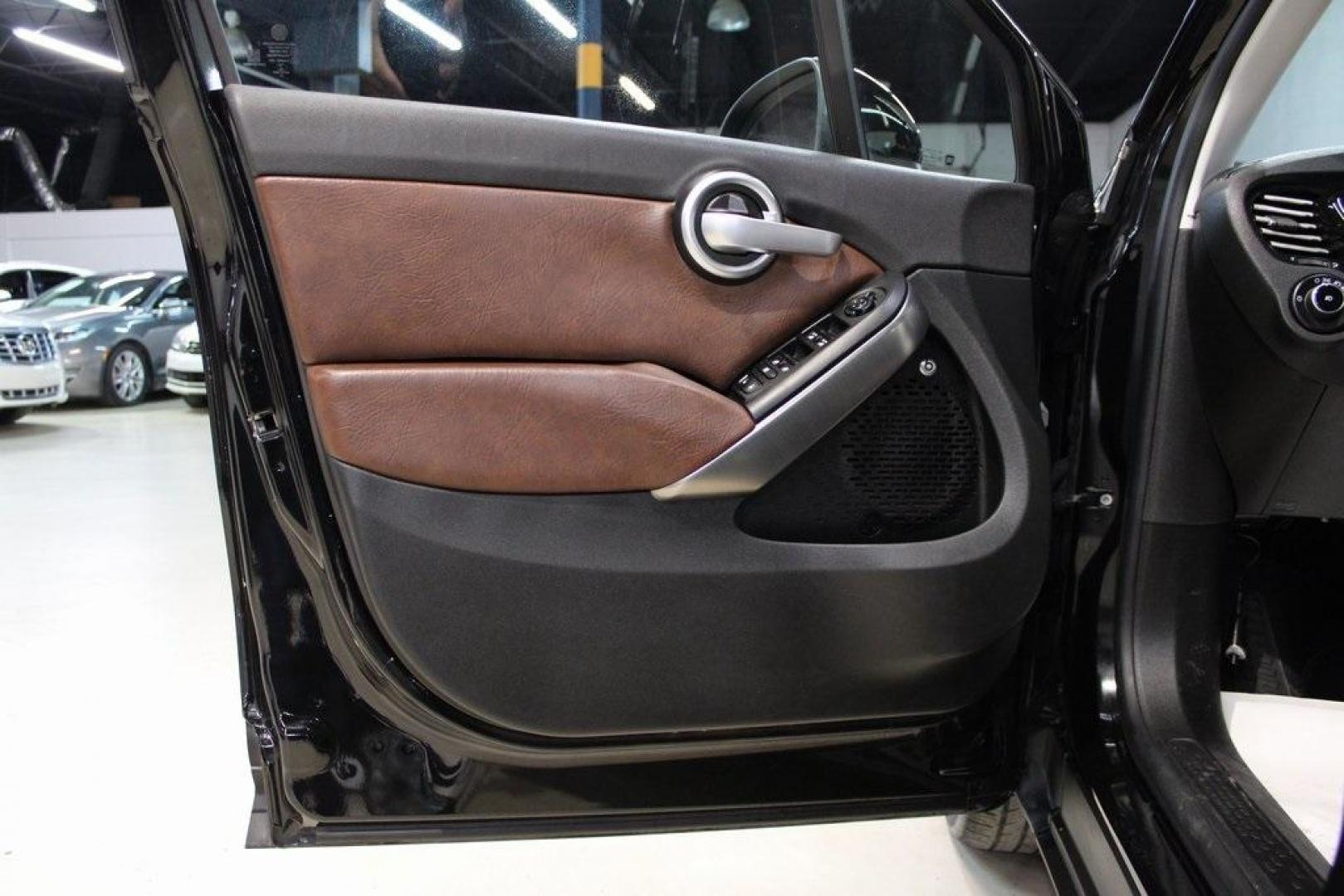2016 Nero Cinema (Black Clear Coat) /Brown Fiat 500X Lounge (ZFBCFXDT8GP) with an 2.4L I4 MultiAir engine, Automatic transmission, located at 15300 Midway Rd., Addison, TX, 75001, (972) 702-0011, 32.958321, -96.838074 - Midway Auto Group in Addison, TX, is excited to offer this 2016 Fiat 500X Easy, a stylish and versatile subcompact crossover SUV that combines Italian design with practical functionality.<br><br>Key Features:<br><br>Engine and Performance: Equipped with a 2.4-liter Tigershark MultiAir 2 inline-4 e - Photo#30