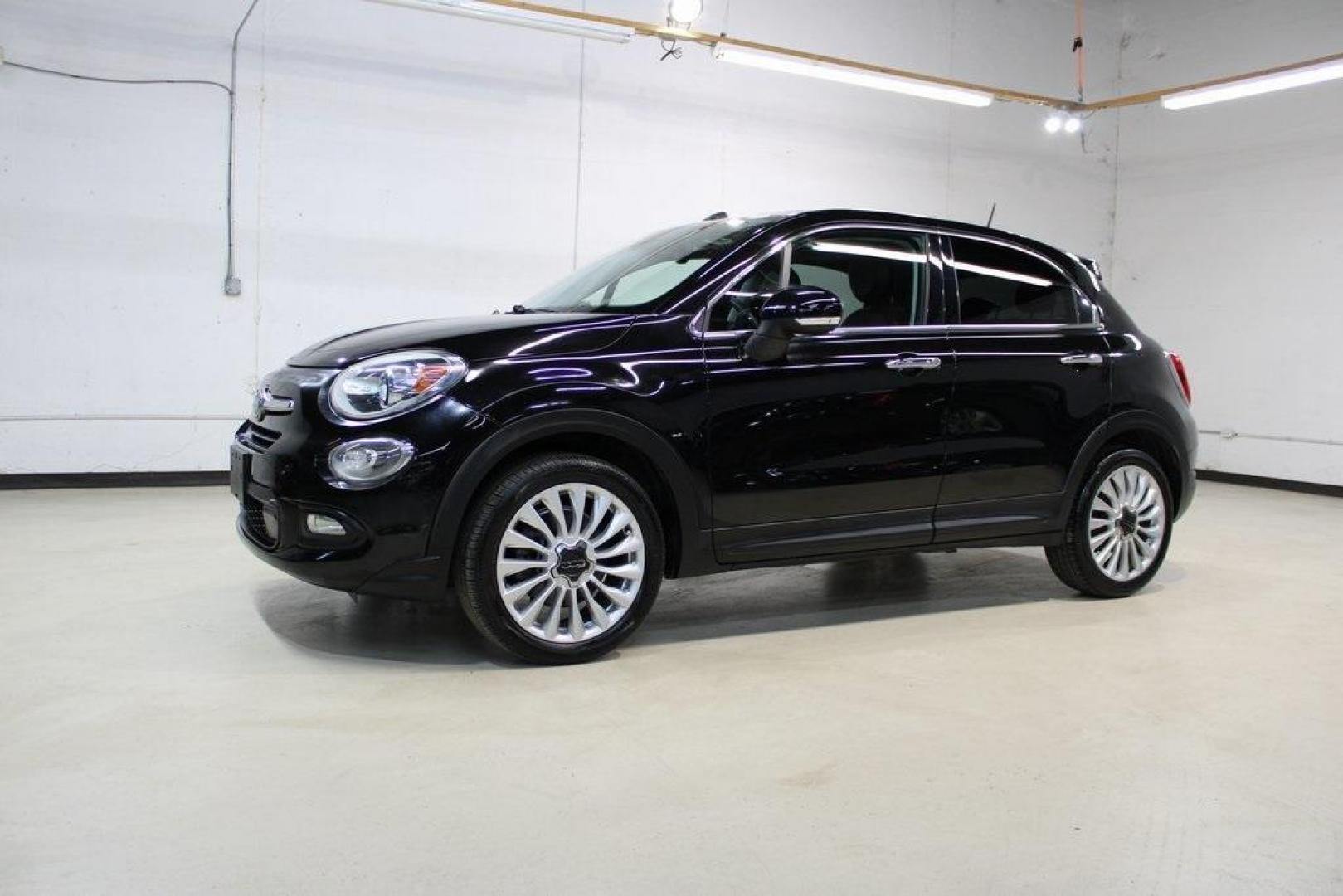 2016 Nero Cinema (Black Clear Coat) /Brown Fiat 500X Lounge (ZFBCFXDT8GP) with an 2.4L I4 MultiAir engine, Automatic transmission, located at 15300 Midway Rd., Addison, TX, 75001, (972) 702-0011, 32.958321, -96.838074 - Midway Auto Group in Addison, TX, is excited to offer this 2016 Fiat 500X Easy, a stylish and versatile subcompact crossover SUV that combines Italian design with practical functionality.<br><br>Key Features:<br><br>Engine and Performance: Equipped with a 2.4-liter Tigershark MultiAir 2 inline-4 e - Photo#4