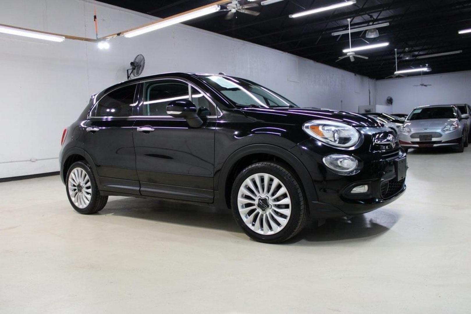 2016 Nero Cinema (Black Clear Coat) /Brown Fiat 500X Lounge (ZFBCFXDT8GP) with an 2.4L I4 MultiAir engine, Automatic transmission, located at 15300 Midway Rd., Addison, TX, 75001, (972) 702-0011, 32.958321, -96.838074 - Midway Auto Group in Addison, TX, is excited to offer this 2016 Fiat 500X Easy, a stylish and versatile subcompact crossover SUV that combines Italian design with practical functionality.<br><br>Key Features:<br><br>Engine and Performance: Equipped with a 2.4-liter Tigershark MultiAir 2 inline-4 e - Photo#6