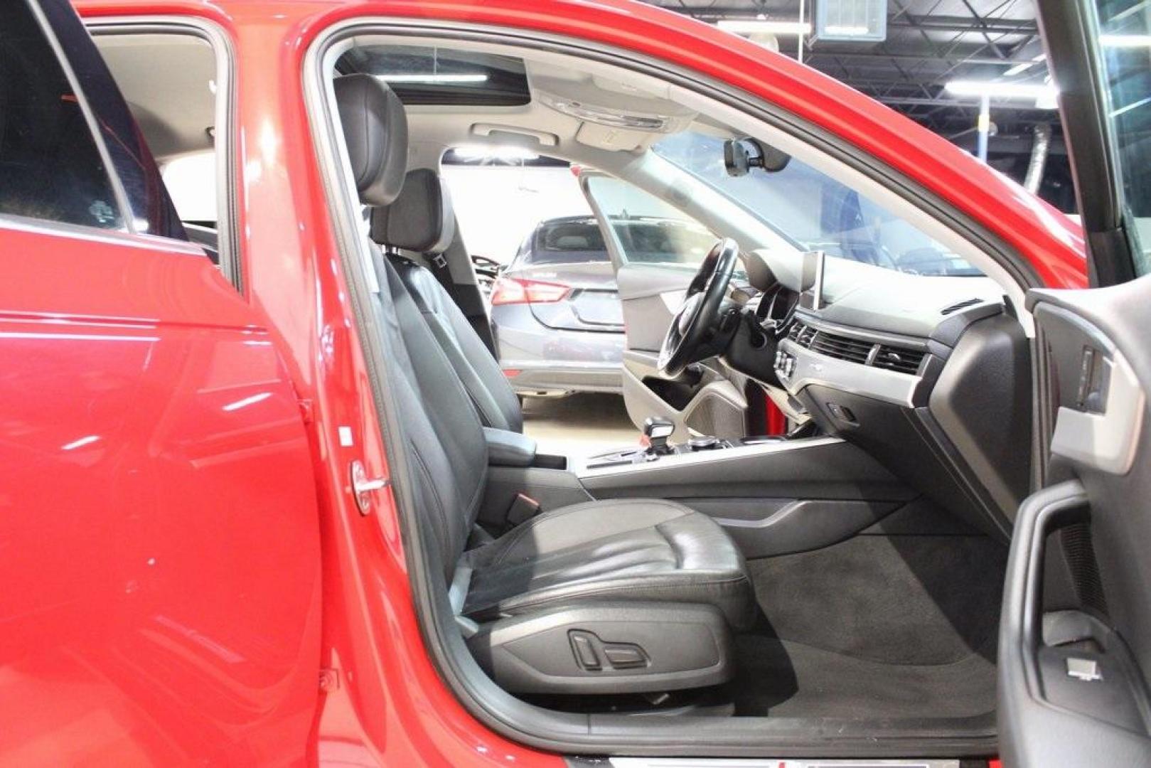 2017 Tango Red /Black Audi A4 2.0T Premium Plus (WAUENAF44HN) with an 2.0L I4 TFSI DOHC engine, Automatic transmission, located at 15300 Midway Rd., Addison, TX, 75001, (972) 702-0011, 32.958321, -96.838074 - Midway Auto Group in Addison, TX, is pleased to offer this 2017 Audi A4 Premium Plus, a luxury sedan that seamlessly blends performance, advanced technology, and sophisticated design.<br><br>Key Features:<br><br>Engine and Performance: Powered by a 2.0-liter TFSI turbocharged engine delivering 252 - Photo#15