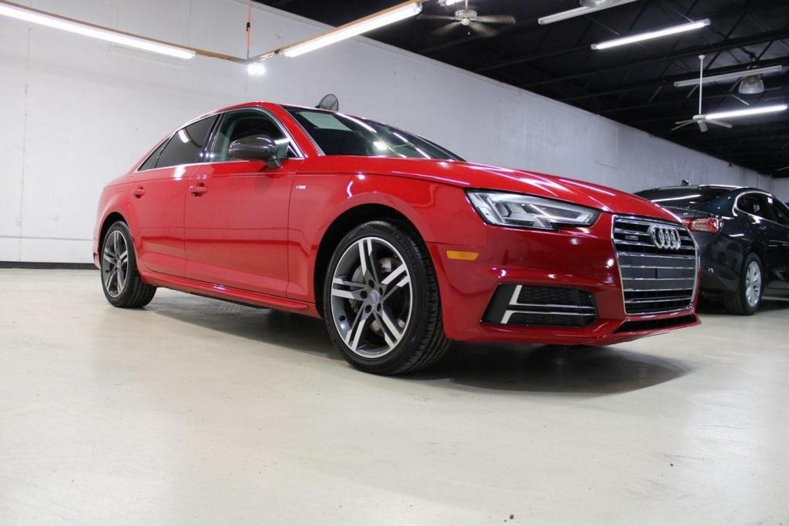 2017 Tango Red /Black Audi A4 2.0T Premium Plus (WAUENAF44HN) with an 2.0L I4 TFSI DOHC engine, Automatic transmission, located at 15300 Midway Rd., Addison, TX, 75001, (972) 702-0011, 32.958321, -96.838074 - Midway Auto Group in Addison, TX, is pleased to offer this 2017 Audi A4 Premium Plus, a luxury sedan that seamlessly blends performance, advanced technology, and sophisticated design.<br><br>Key Features:<br><br>Engine and Performance: Powered by a 2.0-liter TFSI turbocharged engine delivering 252 - Photo#1