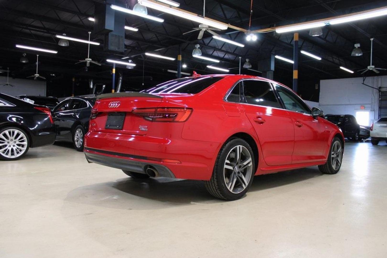 2017 Tango Red /Black Audi A4 2.0T Premium Plus (WAUENAF44HN) with an 2.0L I4 TFSI DOHC engine, Automatic transmission, located at 15300 Midway Rd., Addison, TX, 75001, (972) 702-0011, 32.958321, -96.838074 - Midway Auto Group in Addison, TX, is pleased to offer this 2017 Audi A4 Premium Plus, a luxury sedan that seamlessly blends performance, advanced technology, and sophisticated design.<br><br>Key Features:<br><br>Engine and Performance: Powered by a 2.0-liter TFSI turbocharged engine delivering 252 - Photo#2