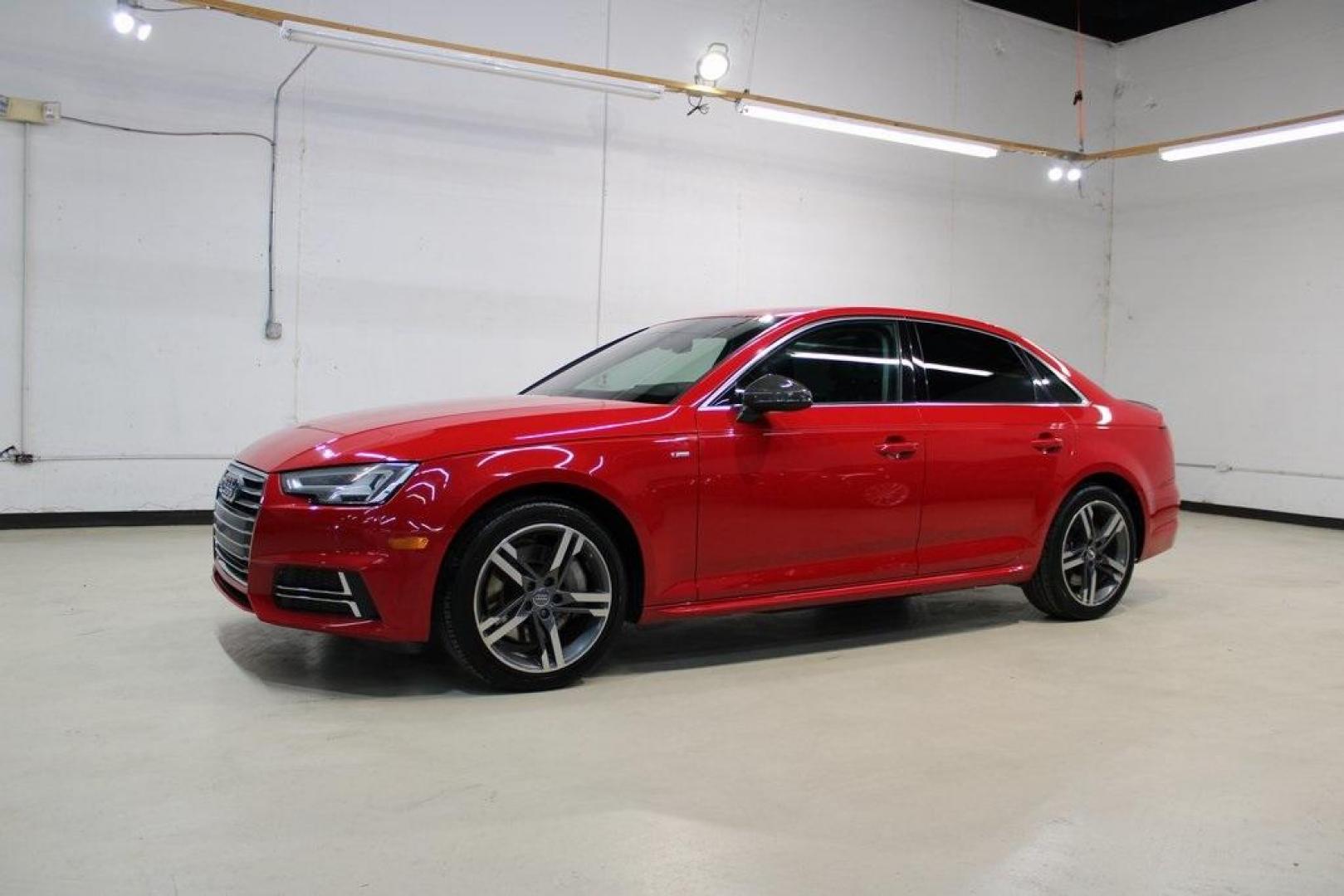 2017 Tango Red /Black Audi A4 2.0T Premium Plus (WAUENAF44HN) with an 2.0L I4 TFSI DOHC engine, Automatic transmission, located at 15300 Midway Rd., Addison, TX, 75001, (972) 702-0011, 32.958321, -96.838074 - Midway Auto Group in Addison, TX, is pleased to offer this 2017 Audi A4 Premium Plus, a luxury sedan that seamlessly blends performance, advanced technology, and sophisticated design.<br><br>Key Features:<br><br>Engine and Performance: Powered by a 2.0-liter TFSI turbocharged engine delivering 252 - Photo#4