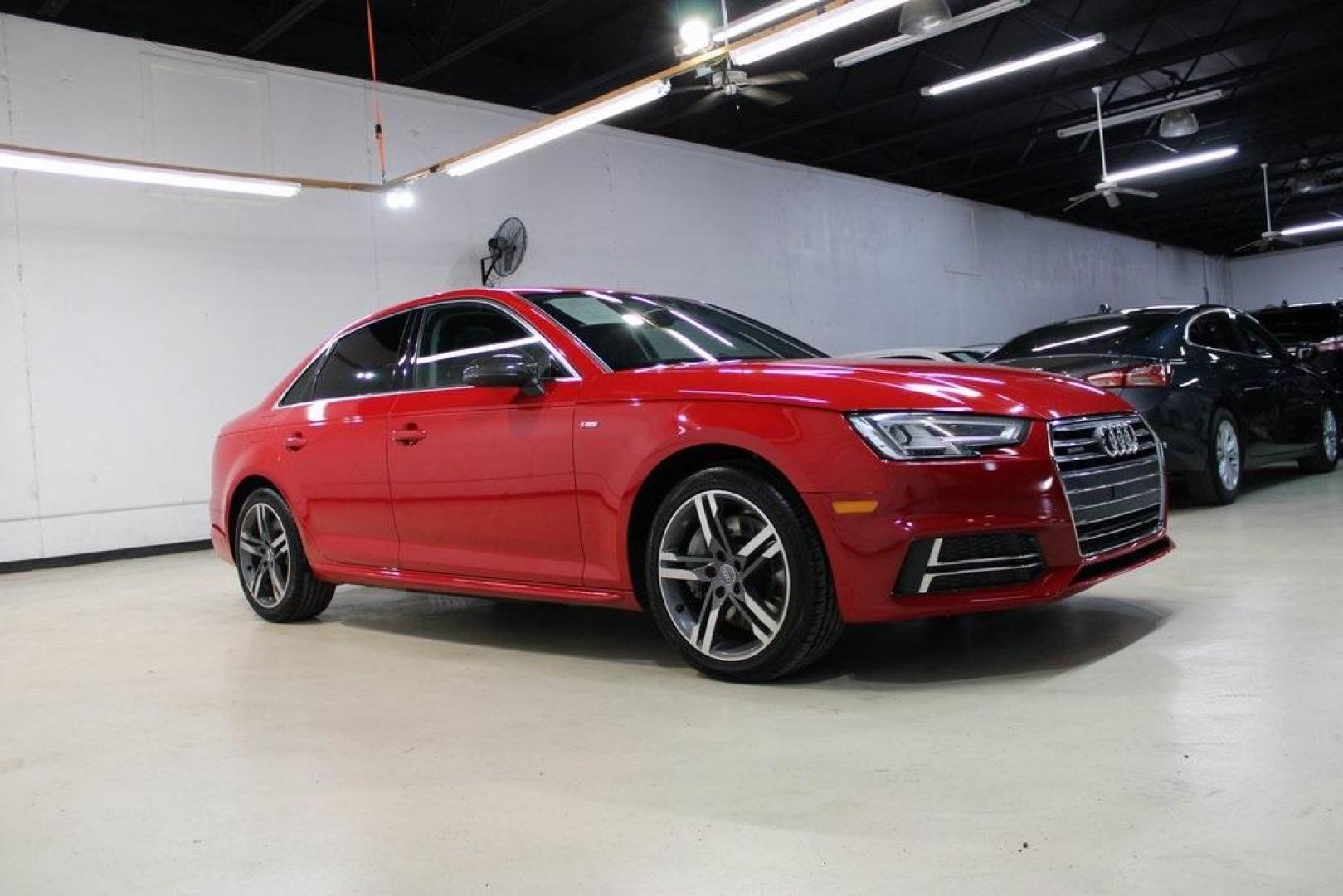 2017 Tango Red /Black Audi A4 2.0T Premium Plus (WAUENAF44HN) with an 2.0L I4 TFSI DOHC engine, Automatic transmission, located at 15300 Midway Rd., Addison, TX, 75001, (972) 702-0011, 32.958321, -96.838074 - Midway Auto Group in Addison, TX, is pleased to offer this 2017 Audi A4 Premium Plus, a luxury sedan that seamlessly blends performance, advanced technology, and sophisticated design.<br><br>Key Features:<br><br>Engine and Performance: Powered by a 2.0-liter TFSI turbocharged engine delivering 252 - Photo#6