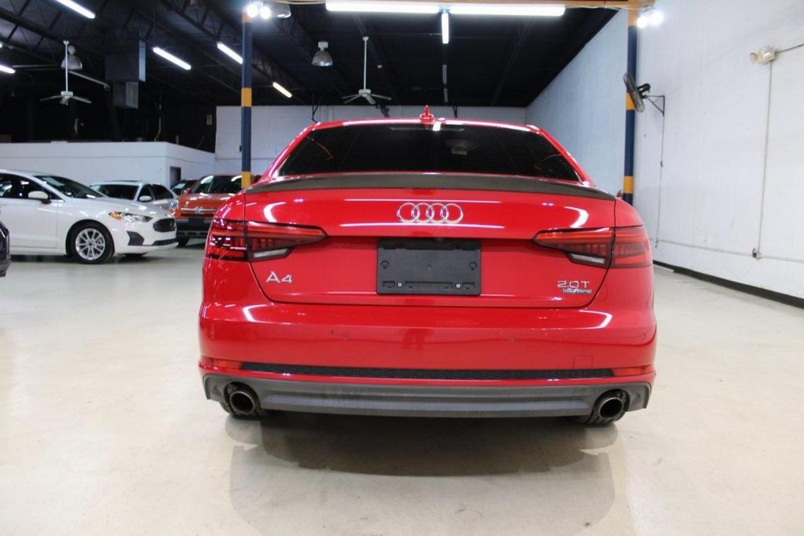 2017 Tango Red /Black Audi A4 2.0T Premium Plus (WAUENAF44HN) with an 2.0L I4 TFSI DOHC engine, Automatic transmission, located at 15300 Midway Rd., Addison, TX, 75001, (972) 702-0011, 32.958321, -96.838074 - Midway Auto Group in Addison, TX, is pleased to offer this 2017 Audi A4 Premium Plus, a luxury sedan that seamlessly blends performance, advanced technology, and sophisticated design.<br><br>Key Features:<br><br>Engine and Performance: Powered by a 2.0-liter TFSI turbocharged engine delivering 252 - Photo#7