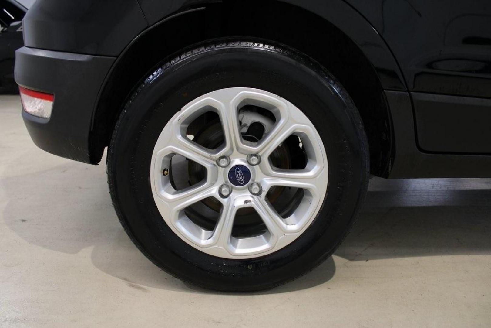 2018 Shadow Black /Ebony Black Ford EcoSport SE (MAJ3P1TE1JC) with an EcoBoost 1.0L I3 GTDi DOHC Turbocharged VCT engine, Automatic transmission, located at 15300 Midway Rd., Addison, TX, 75001, (972) 702-0011, 32.958321, -96.838074 - Midway Auto Group in Addison, TX, is excited to present this 2018 Ford EcoSport SE, a compact SUV that combines versatility, efficiency, and modern features to enhance your driving experience.<br><br>Key Features:<br><br>Engine and Performance: Powered by a 1.0-liter EcoBoost turbocharged engine, - Photo#10