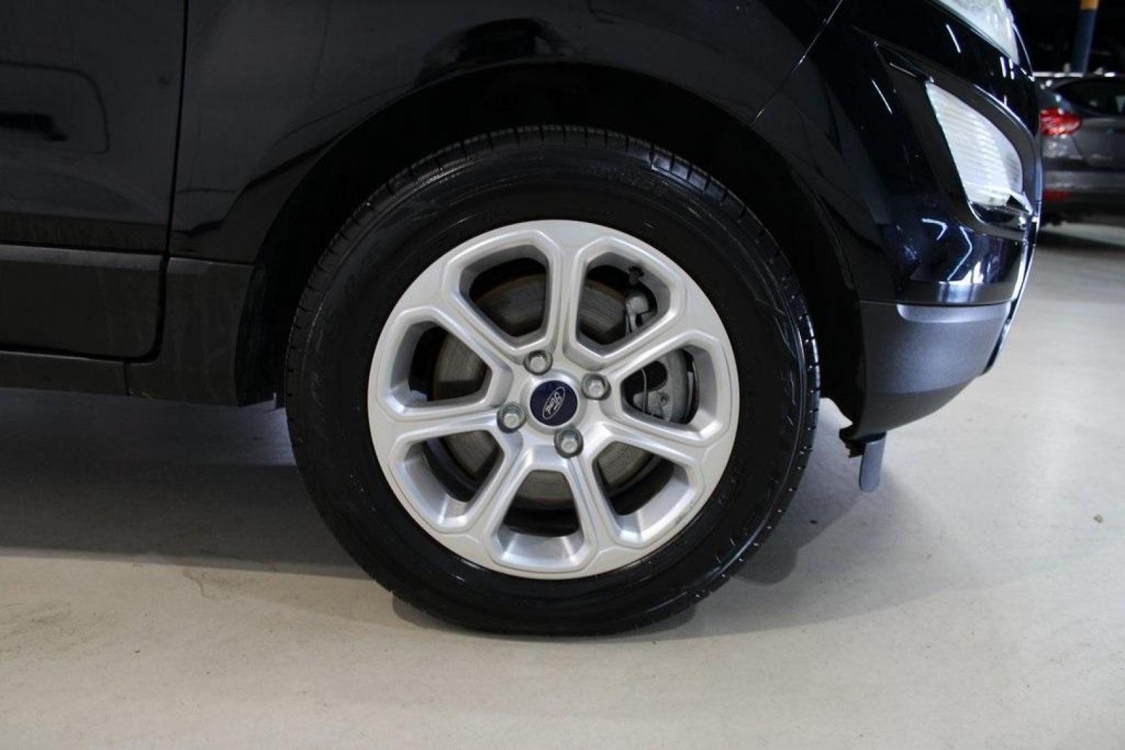 2018 Shadow Black /Ebony Black Ford EcoSport SE (MAJ3P1TE1JC) with an EcoBoost 1.0L I3 GTDi DOHC Turbocharged VCT engine, Automatic transmission, located at 15300 Midway Rd., Addison, TX, 75001, (972) 702-0011, 32.958321, -96.838074 - Midway Auto Group in Addison, TX, is excited to present this 2018 Ford EcoSport SE, a compact SUV that combines versatility, efficiency, and modern features to enhance your driving experience.<br><br>Key Features:<br><br>Engine and Performance: Powered by a 1.0-liter EcoBoost turbocharged engine, - Photo#11