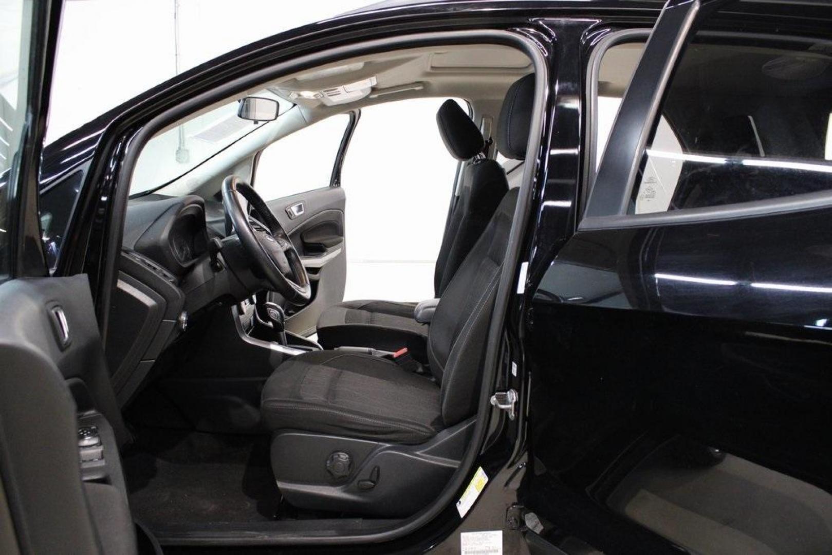 2018 Shadow Black /Ebony Black Ford EcoSport SE (MAJ3P1TE1JC) with an EcoBoost 1.0L I3 GTDi DOHC Turbocharged VCT engine, Automatic transmission, located at 15300 Midway Rd., Addison, TX, 75001, (972) 702-0011, 32.958321, -96.838074 - Midway Auto Group in Addison, TX, is excited to present this 2018 Ford EcoSport SE, a compact SUV that combines versatility, efficiency, and modern features to enhance your driving experience.<br><br>Key Features:<br><br>Engine and Performance: Powered by a 1.0-liter EcoBoost turbocharged engine, - Photo#13