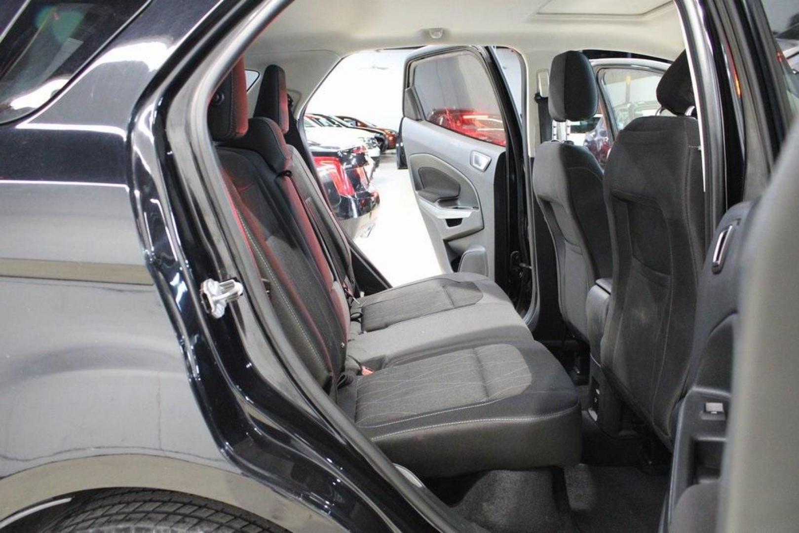 2018 Shadow Black /Ebony Black Ford EcoSport SE (MAJ3P1TE1JC) with an EcoBoost 1.0L I3 GTDi DOHC Turbocharged VCT engine, Automatic transmission, located at 15300 Midway Rd., Addison, TX, 75001, (972) 702-0011, 32.958321, -96.838074 - Midway Auto Group in Addison, TX, is excited to present this 2018 Ford EcoSport SE, a compact SUV that combines versatility, efficiency, and modern features to enhance your driving experience.<br><br>Key Features:<br><br>Engine and Performance: Powered by a 1.0-liter EcoBoost turbocharged engine, - Photo#15