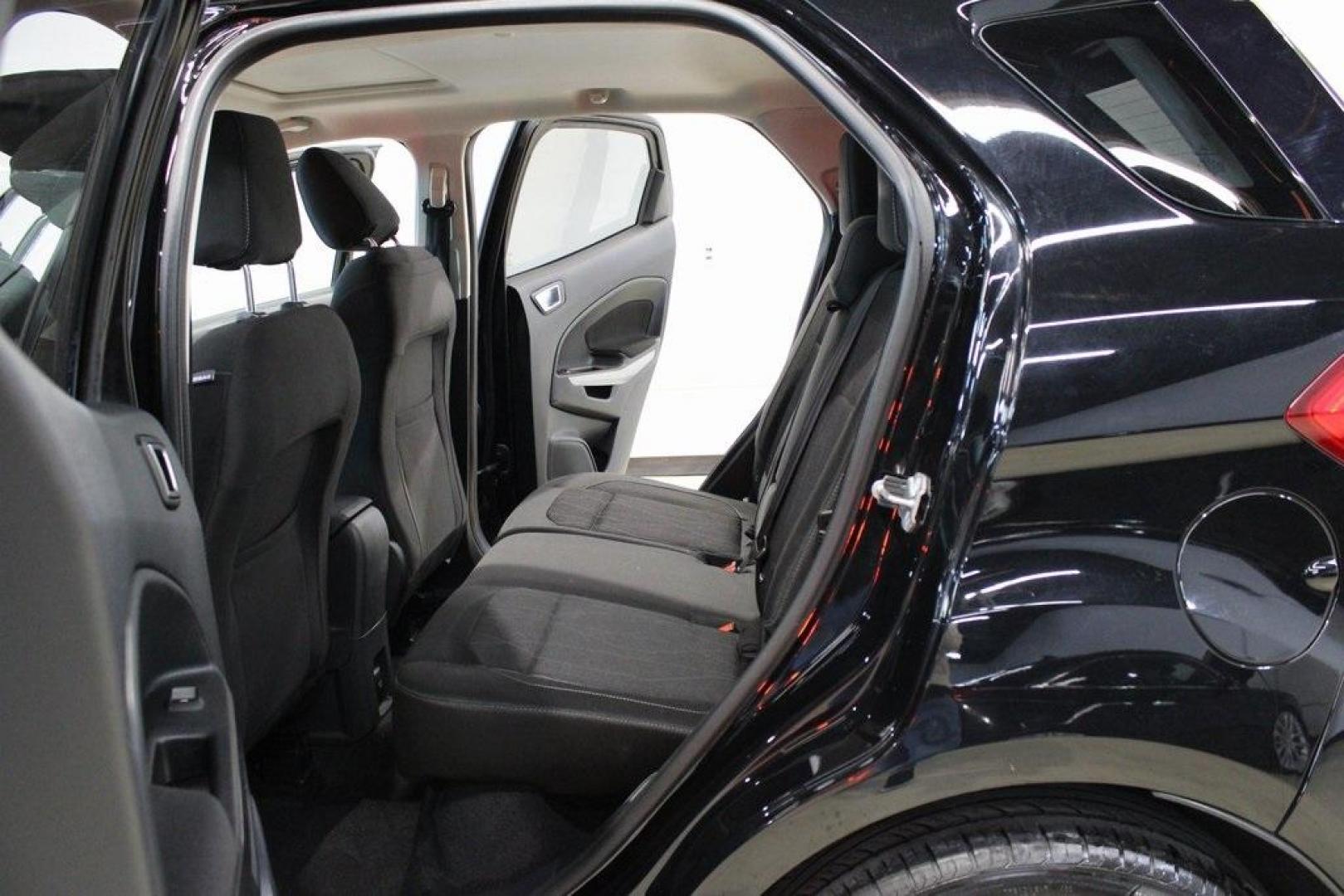 2018 Shadow Black /Ebony Black Ford EcoSport SE (MAJ3P1TE1JC) with an EcoBoost 1.0L I3 GTDi DOHC Turbocharged VCT engine, Automatic transmission, located at 15300 Midway Rd., Addison, TX, 75001, (972) 702-0011, 32.958321, -96.838074 - Midway Auto Group in Addison, TX, is excited to present this 2018 Ford EcoSport SE, a compact SUV that combines versatility, efficiency, and modern features to enhance your driving experience.<br><br>Key Features:<br><br>Engine and Performance: Powered by a 1.0-liter EcoBoost turbocharged engine, - Photo#16