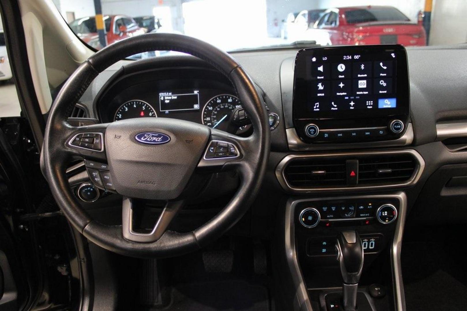 2018 Shadow Black /Ebony Black Ford EcoSport SE (MAJ3P1TE1JC) with an EcoBoost 1.0L I3 GTDi DOHC Turbocharged VCT engine, Automatic transmission, located at 15300 Midway Rd., Addison, TX, 75001, (972) 702-0011, 32.958321, -96.838074 - Midway Auto Group in Addison, TX, is excited to present this 2018 Ford EcoSport SE, a compact SUV that combines versatility, efficiency, and modern features to enhance your driving experience.<br><br>Key Features:<br><br>Engine and Performance: Powered by a 1.0-liter EcoBoost turbocharged engine, - Photo#17
