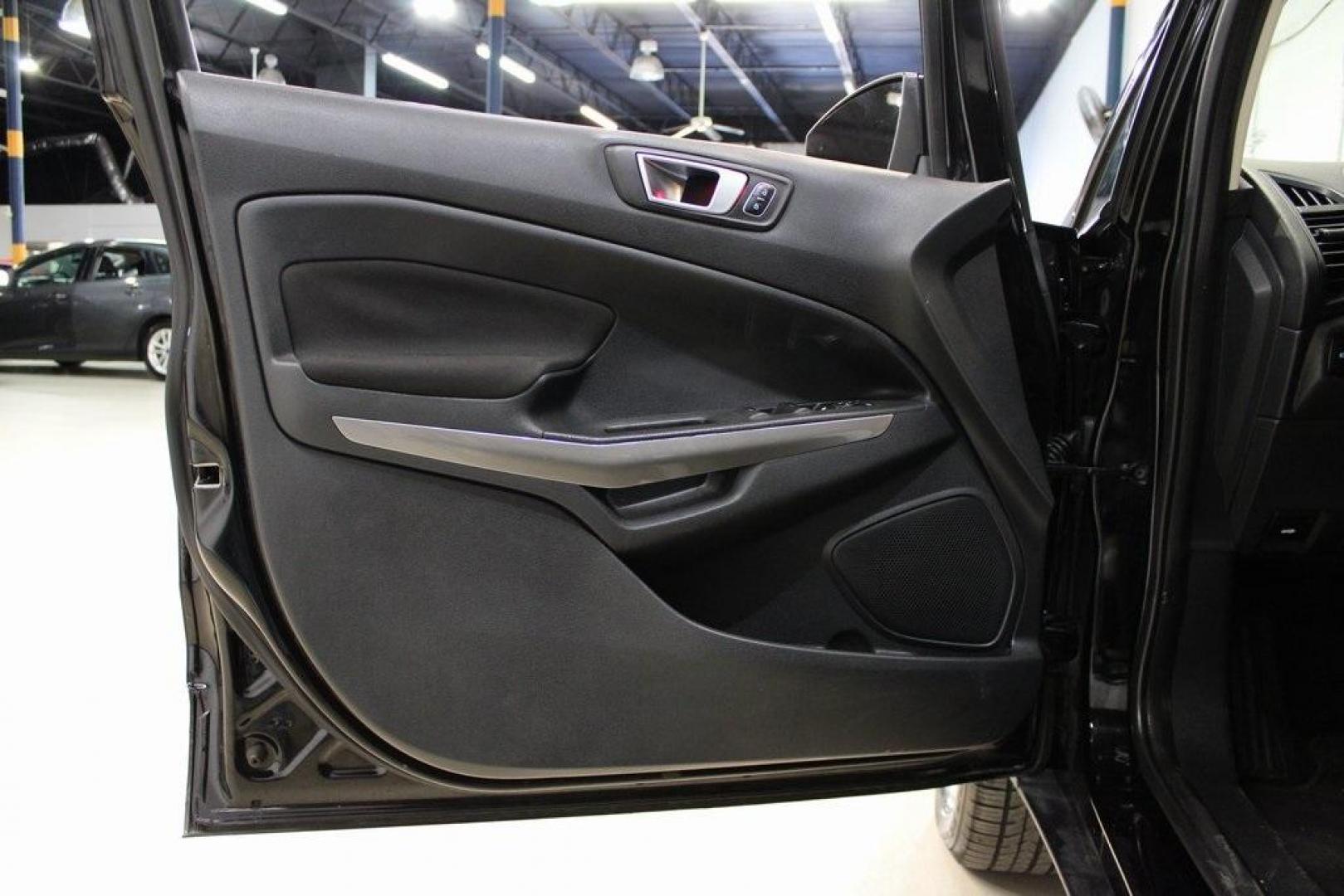 2018 Shadow Black /Ebony Black Ford EcoSport SE (MAJ3P1TE1JC) with an EcoBoost 1.0L I3 GTDi DOHC Turbocharged VCT engine, Automatic transmission, located at 15300 Midway Rd., Addison, TX, 75001, (972) 702-0011, 32.958321, -96.838074 - Midway Auto Group in Addison, TX, is excited to present this 2018 Ford EcoSport SE, a compact SUV that combines versatility, efficiency, and modern features to enhance your driving experience.<br><br>Key Features:<br><br>Engine and Performance: Powered by a 1.0-liter EcoBoost turbocharged engine, - Photo#27