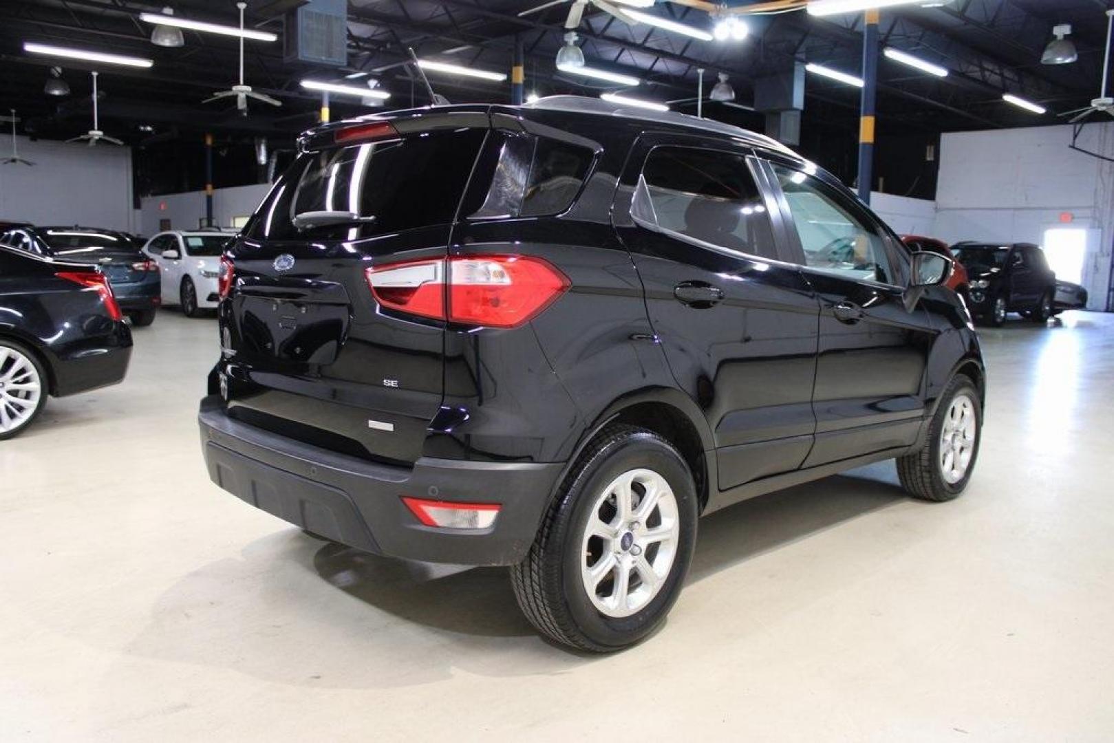 2018 Shadow Black /Ebony Black Ford EcoSport SE (MAJ3P1TE1JC) with an EcoBoost 1.0L I3 GTDi DOHC Turbocharged VCT engine, Automatic transmission, located at 15300 Midway Rd., Addison, TX, 75001, (972) 702-0011, 32.958321, -96.838074 - Midway Auto Group in Addison, TX, is excited to present this 2018 Ford EcoSport SE, a compact SUV that combines versatility, efficiency, and modern features to enhance your driving experience.<br><br>Key Features:<br><br>Engine and Performance: Powered by a 1.0-liter EcoBoost turbocharged engine, - Photo#2
