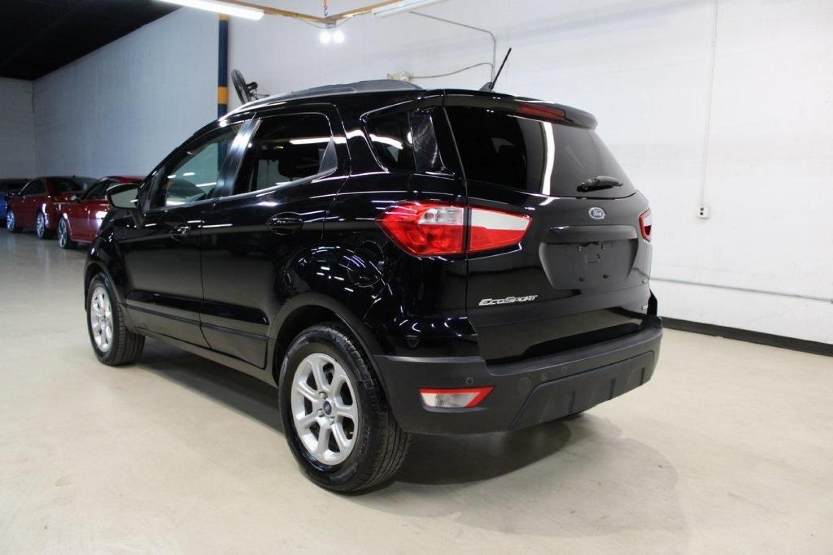 2018 Shadow Black /Ebony Black Ford EcoSport SE (MAJ3P1TE1JC) with an EcoBoost 1.0L I3 GTDi DOHC Turbocharged VCT engine, Automatic transmission, located at 15300 Midway Rd., Addison, TX, 75001, (972) 702-0011, 32.958321, -96.838074 - Midway Auto Group in Addison, TX, is excited to present this 2018 Ford EcoSport SE, a compact SUV that combines versatility, efficiency, and modern features to enhance your driving experience.<br><br>Key Features:<br><br>Engine and Performance: Powered by a 1.0-liter EcoBoost turbocharged engine, - Photo#3