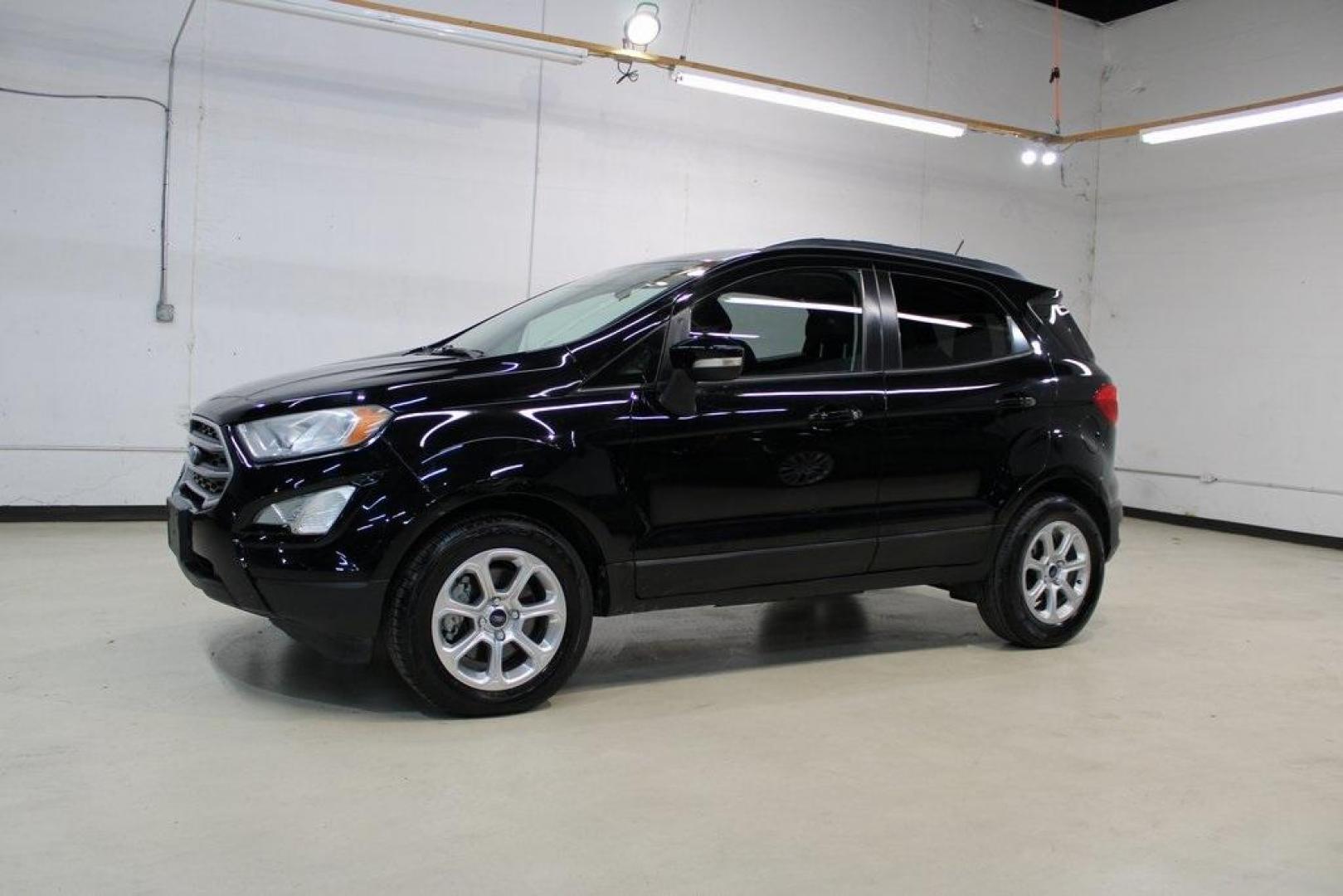 2018 Shadow Black /Ebony Black Ford EcoSport SE (MAJ3P1TE1JC) with an EcoBoost 1.0L I3 GTDi DOHC Turbocharged VCT engine, Automatic transmission, located at 15300 Midway Rd., Addison, TX, 75001, (972) 702-0011, 32.958321, -96.838074 - Midway Auto Group in Addison, TX, is excited to present this 2018 Ford EcoSport SE, a compact SUV that combines versatility, efficiency, and modern features to enhance your driving experience.<br><br>Key Features:<br><br>Engine and Performance: Powered by a 1.0-liter EcoBoost turbocharged engine, - Photo#4
