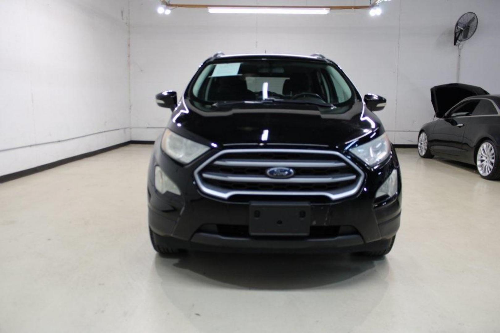 2018 Shadow Black /Ebony Black Ford EcoSport SE (MAJ3P1TE1JC) with an EcoBoost 1.0L I3 GTDi DOHC Turbocharged VCT engine, Automatic transmission, located at 15300 Midway Rd., Addison, TX, 75001, (972) 702-0011, 32.958321, -96.838074 - Midway Auto Group in Addison, TX, is excited to present this 2018 Ford EcoSport SE, a compact SUV that combines versatility, efficiency, and modern features to enhance your driving experience.<br><br>Key Features:<br><br>Engine and Performance: Powered by a 1.0-liter EcoBoost turbocharged engine, - Photo#5