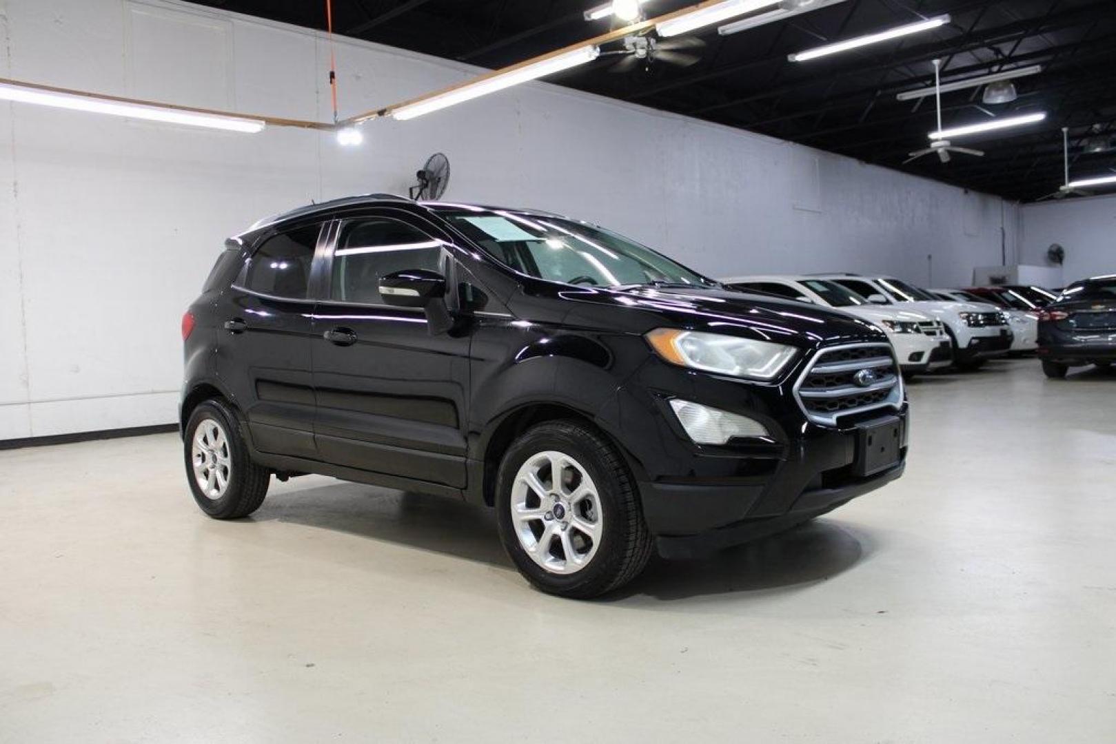 2018 Shadow Black /Ebony Black Ford EcoSport SE (MAJ3P1TE1JC) with an EcoBoost 1.0L I3 GTDi DOHC Turbocharged VCT engine, Automatic transmission, located at 15300 Midway Rd., Addison, TX, 75001, (972) 702-0011, 32.958321, -96.838074 - Midway Auto Group in Addison, TX, is excited to present this 2018 Ford EcoSport SE, a compact SUV that combines versatility, efficiency, and modern features to enhance your driving experience.<br><br>Key Features:<br><br>Engine and Performance: Powered by a 1.0-liter EcoBoost turbocharged engine, - Photo#6