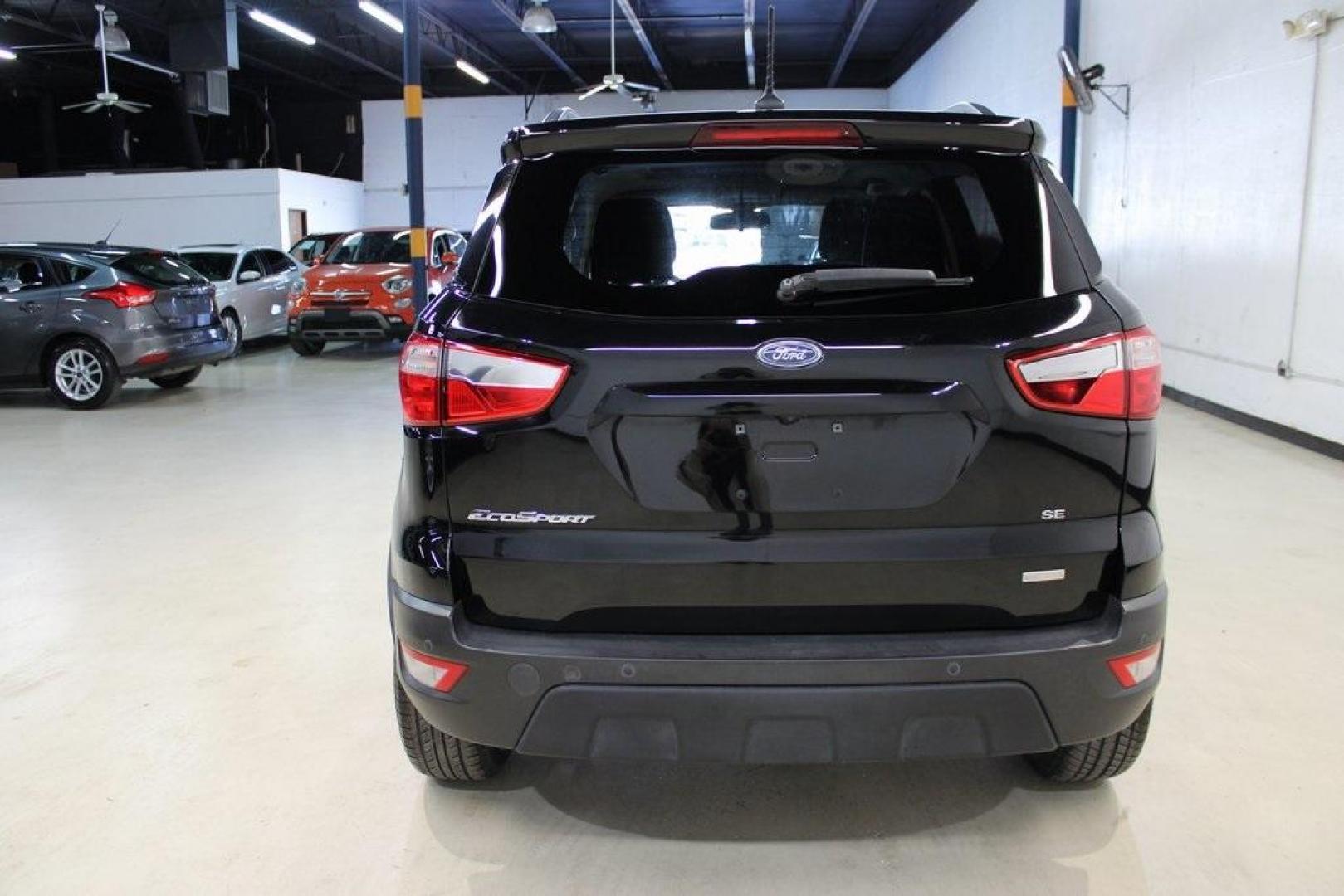 2018 Shadow Black /Ebony Black Ford EcoSport SE (MAJ3P1TE1JC) with an EcoBoost 1.0L I3 GTDi DOHC Turbocharged VCT engine, Automatic transmission, located at 15300 Midway Rd., Addison, TX, 75001, (972) 702-0011, 32.958321, -96.838074 - Midway Auto Group in Addison, TX, is excited to present this 2018 Ford EcoSport SE, a compact SUV that combines versatility, efficiency, and modern features to enhance your driving experience.<br><br>Key Features:<br><br>Engine and Performance: Powered by a 1.0-liter EcoBoost turbocharged engine, - Photo#7