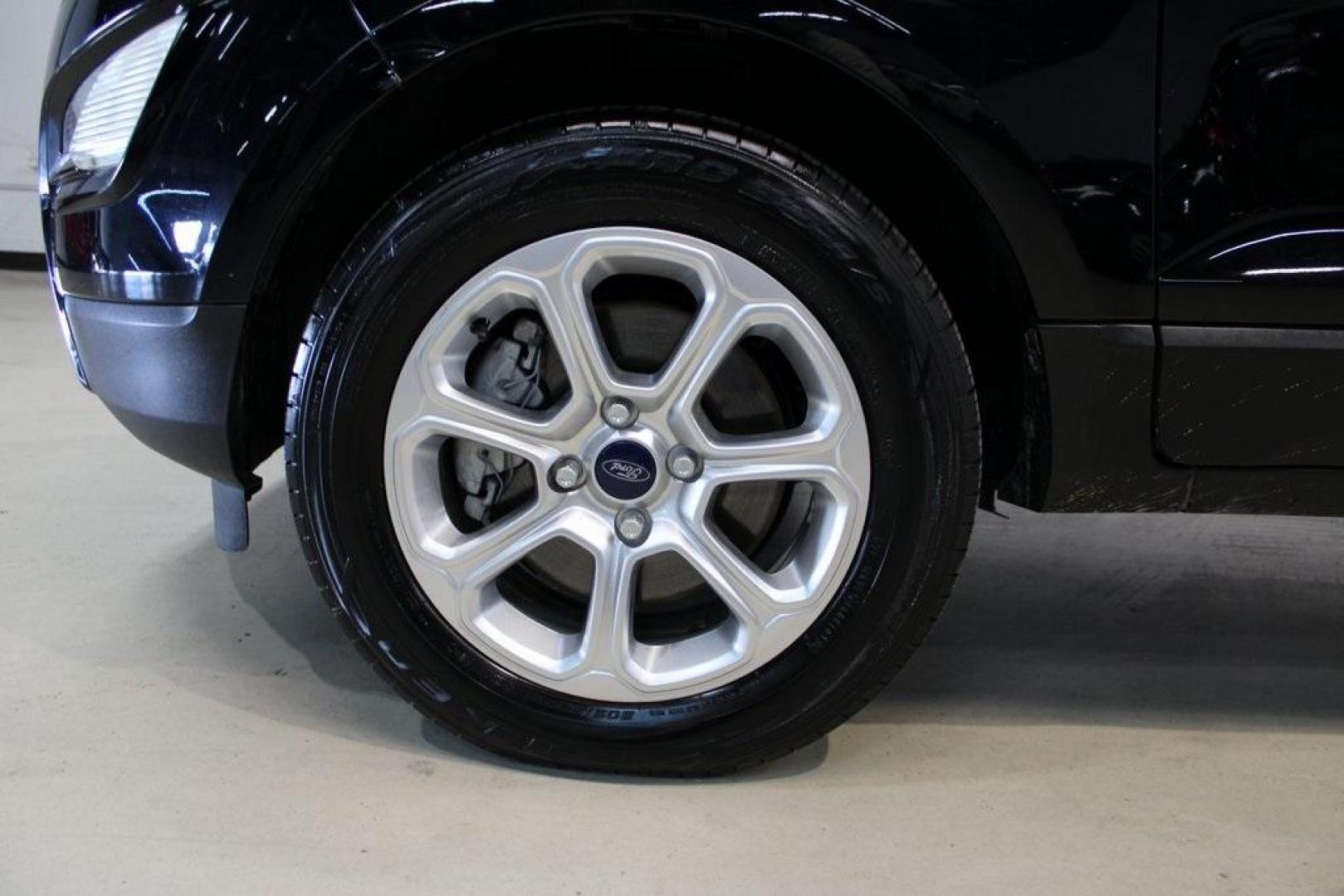2018 Shadow Black /Ebony Black Ford EcoSport SE (MAJ3P1TE1JC) with an EcoBoost 1.0L I3 GTDi DOHC Turbocharged VCT engine, Automatic transmission, located at 15300 Midway Rd., Addison, TX, 75001, (972) 702-0011, 32.958321, -96.838074 - Midway Auto Group in Addison, TX, is excited to present this 2018 Ford EcoSport SE, a compact SUV that combines versatility, efficiency, and modern features to enhance your driving experience.<br><br>Key Features:<br><br>Engine and Performance: Powered by a 1.0-liter EcoBoost turbocharged engine, - Photo#8