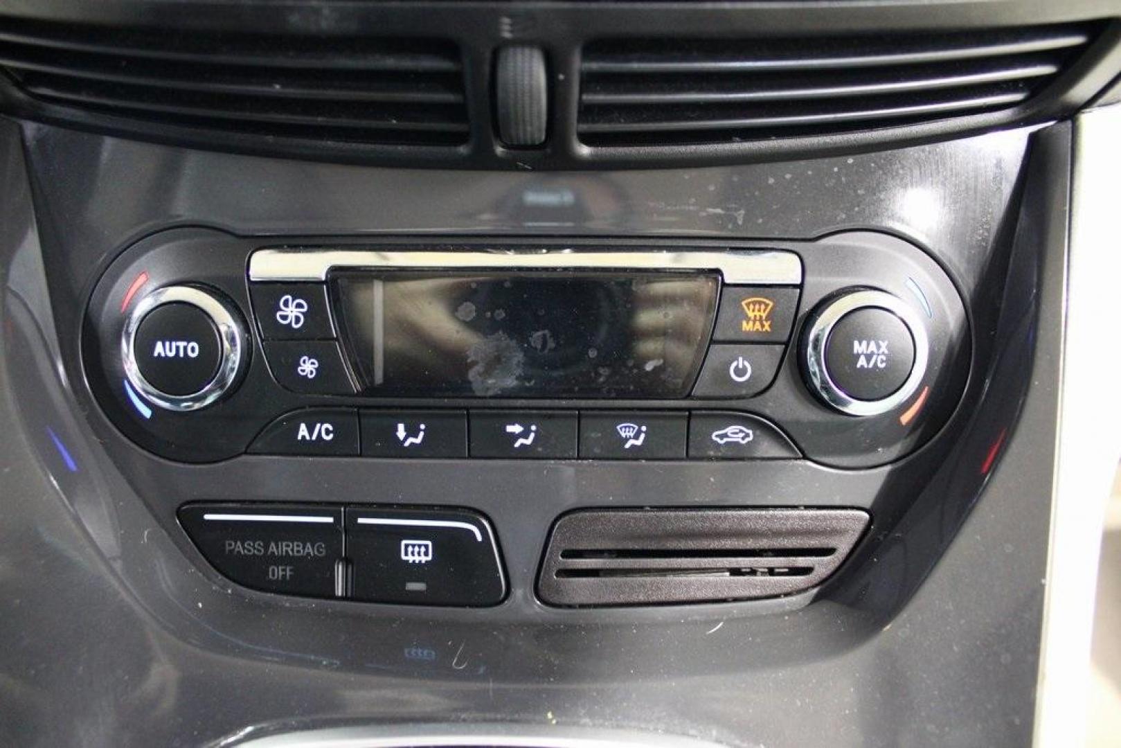 2015 Magnetic /Medium Light Stone Ford C-Max Hybrid SEL (1FADP5BU1FL) with an I4 Hybrid engine, CVT transmission, located at 15300 Midway Rd., Addison, TX, 75001, (972) 702-0011, 32.958321, -96.838074 - Midway Auto Group in Addison, TX, is pleased to offer this 2015 Ford C-Max SEL Hybrid, a versatile and fuel-efficient hatchback designed to enhance your driving experience. With 72,000 miles on the odometer, this well-maintained vehicle is available for $9,950. <br><br><br>Key Features:<br><br>Conve - Photo#20