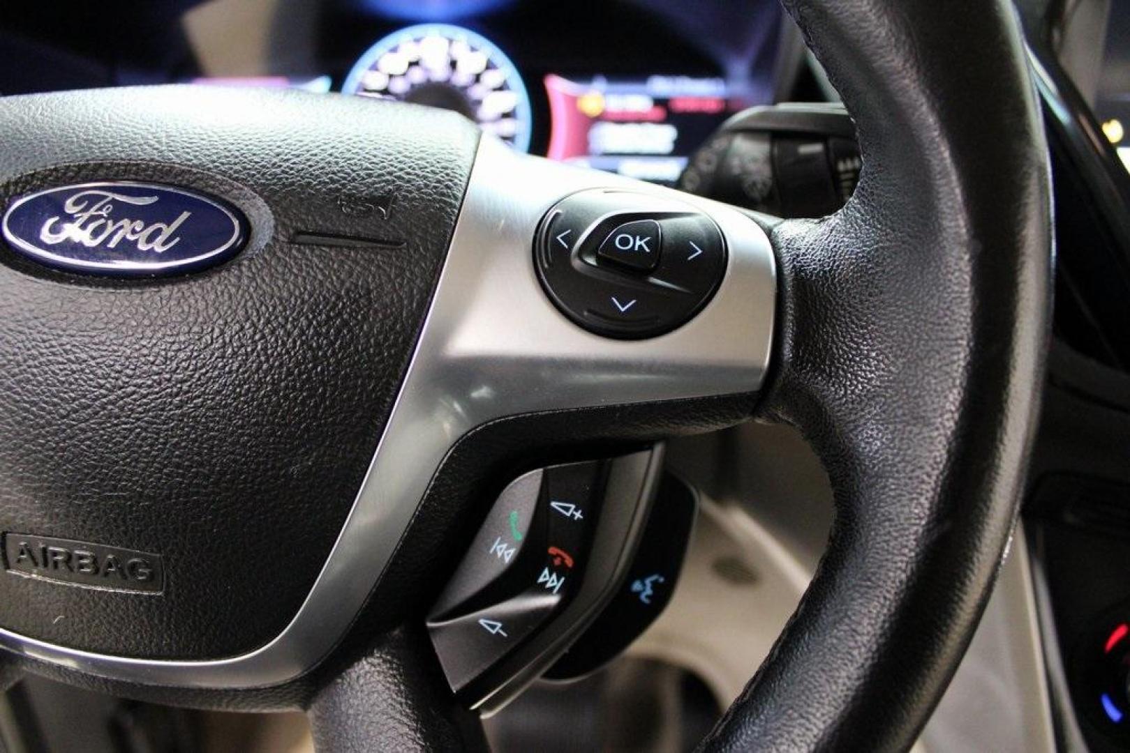 2015 Magnetic /Medium Light Stone Ford C-Max Hybrid SEL (1FADP5BU1FL) with an I4 Hybrid engine, CVT transmission, located at 15300 Midway Rd., Addison, TX, 75001, (972) 702-0011, 32.958321, -96.838074 - Midway Auto Group in Addison, TX, is pleased to offer this 2015 Ford C-Max SEL Hybrid, a versatile and fuel-efficient hatchback designed to enhance your driving experience. With 72,000 miles on the odometer, this well-maintained vehicle is available for $9,950. <br><br><br>Key Features:<br><br>Conve - Photo#23