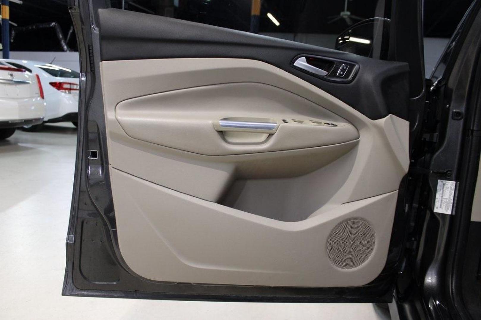 2015 Magnetic /Medium Light Stone Ford C-Max Hybrid SEL (1FADP5BU1FL) with an I4 Hybrid engine, CVT transmission, located at 15300 Midway Rd., Addison, TX, 75001, (972) 702-0011, 32.958321, -96.838074 - Midway Auto Group in Addison, TX, is pleased to offer this 2015 Ford C-Max SEL Hybrid, a versatile and fuel-efficient hatchback designed to enhance your driving experience. With 72,000 miles on the odometer, this well-maintained vehicle is available for $9,950. <br><br><br>Key Features:<br><br>Conve - Photo#26