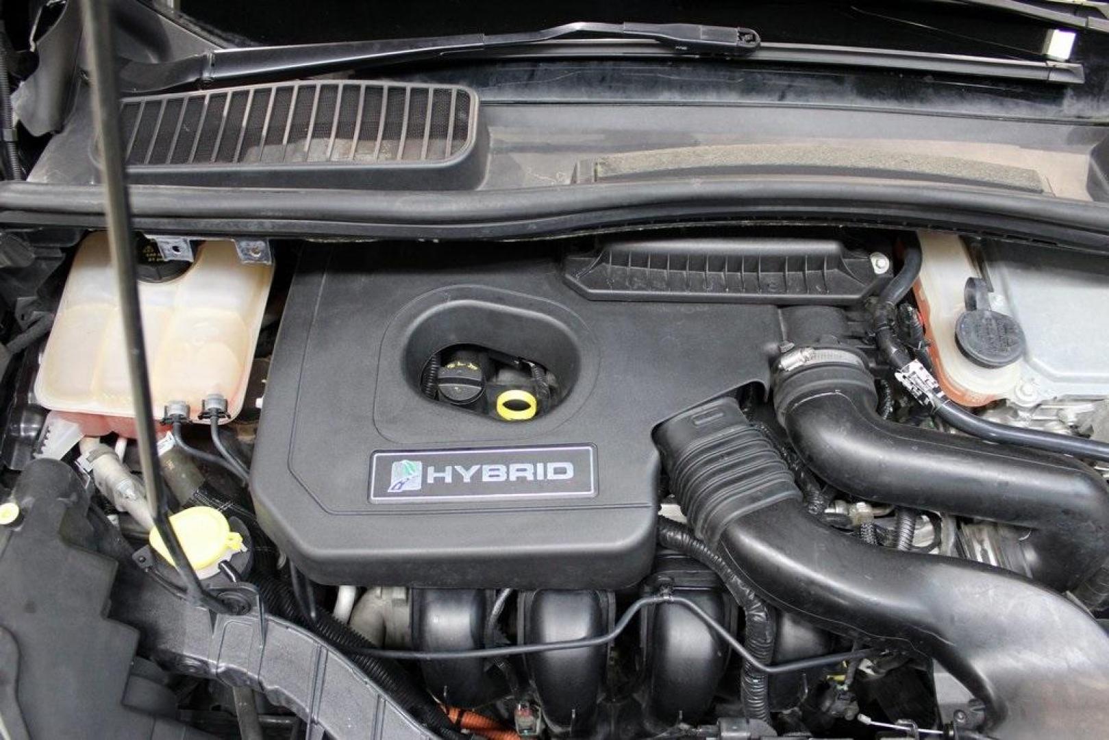 2015 Magnetic /Medium Light Stone Ford C-Max Hybrid SEL (1FADP5BU1FL) with an I4 Hybrid engine, CVT transmission, located at 15300 Midway Rd., Addison, TX, 75001, (972) 702-0011, 32.958321, -96.838074 - Midway Auto Group in Addison, TX, is pleased to offer this 2015 Ford C-Max SEL Hybrid, a versatile and fuel-efficient hatchback designed to enhance your driving experience. With 72,000 miles on the odometer, this well-maintained vehicle is available for $9,950. <br><br><br>Key Features:<br><br>Conve - Photo#28
