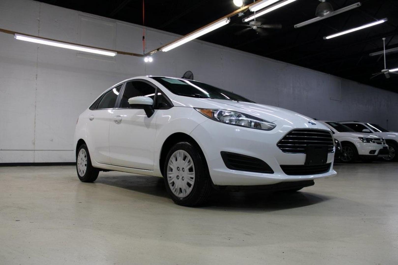 2017 Oxford White /Black Ford Fiesta S (3FADP4AJ9HM) with an 1.6L I4 Ti-VCT engine, Automatic transmission, located at 15300 Midway Rd., Addison, TX, 75001, (972) 702-0011, 32.958321, -96.838074 - Introducing the 2017 Ford Fiesta S Sedan, now available at Midway Auto Group in Addison, Texas. This compact, efficient, and budget-friendly sedan is designed for everyday drivability. Whether you're commuting to work or searching for a reliable first car, the Fiesta delivers dependable performance - Photo#1
