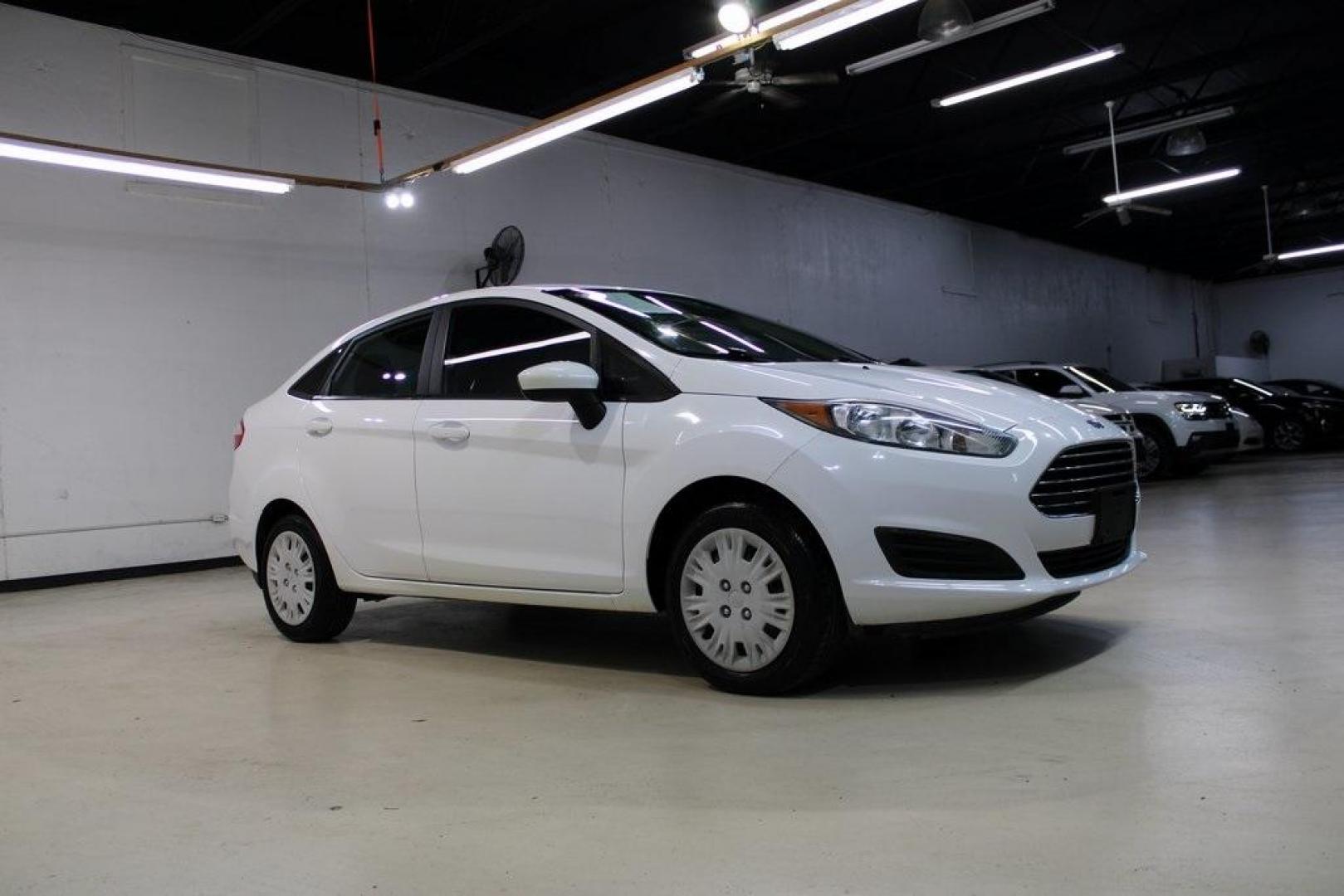 2017 Oxford White /Black Ford Fiesta S (3FADP4AJ9HM) with an 1.6L I4 Ti-VCT engine, Automatic transmission, located at 15300 Midway Rd., Addison, TX, 75001, (972) 702-0011, 32.958321, -96.838074 - Introducing the 2017 Ford Fiesta S Sedan, now available at Midway Auto Group in Addison, Texas. This compact, efficient, and budget-friendly sedan is designed for everyday drivability. Whether you're commuting to work or searching for a reliable first car, the Fiesta delivers dependable performance - Photo#6